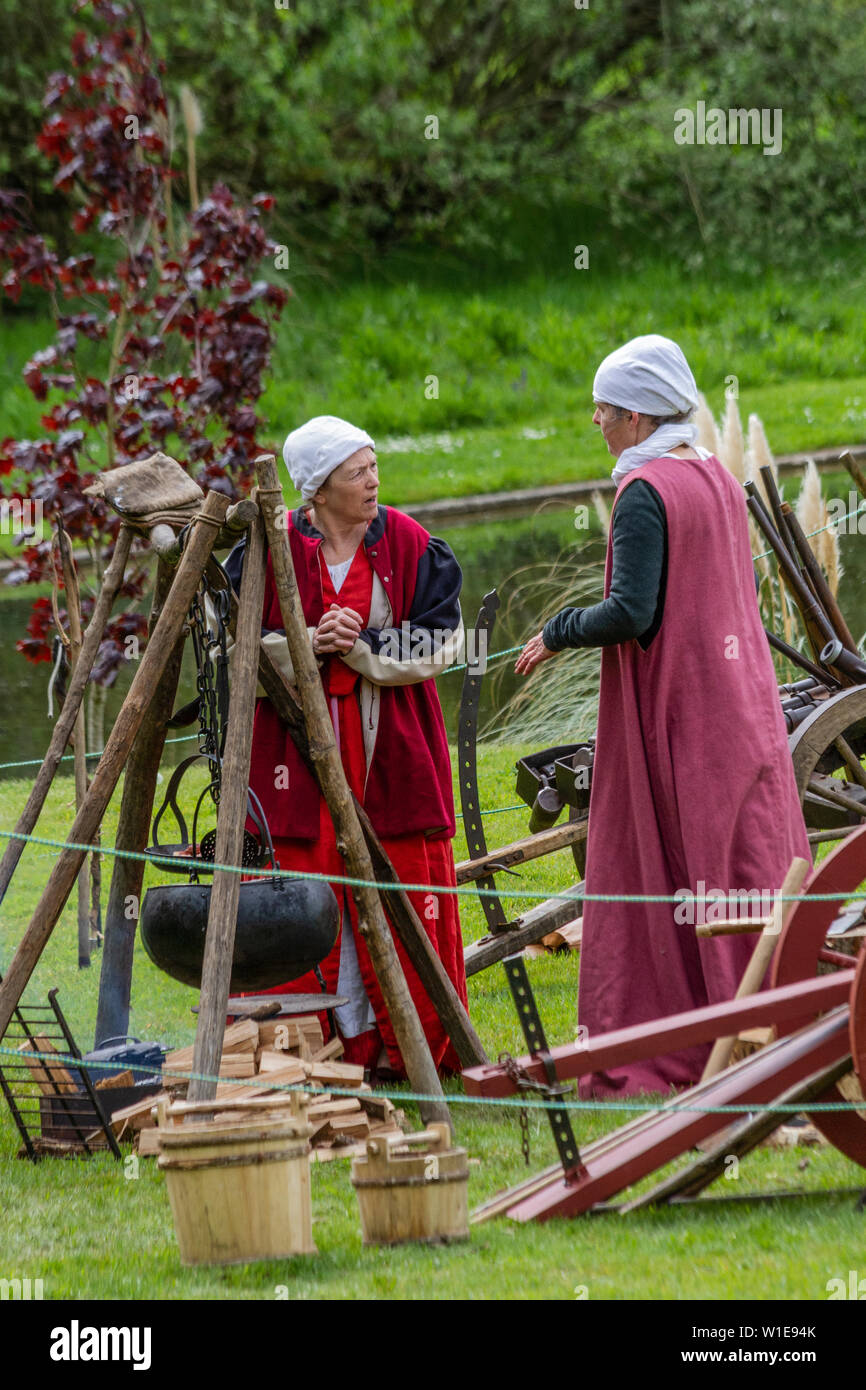 Two women in medieval costume Stock Photo - Alamy