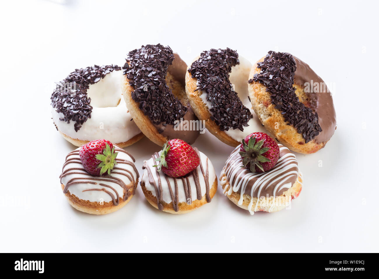 various donuts on white background Stock Photo - Alamy