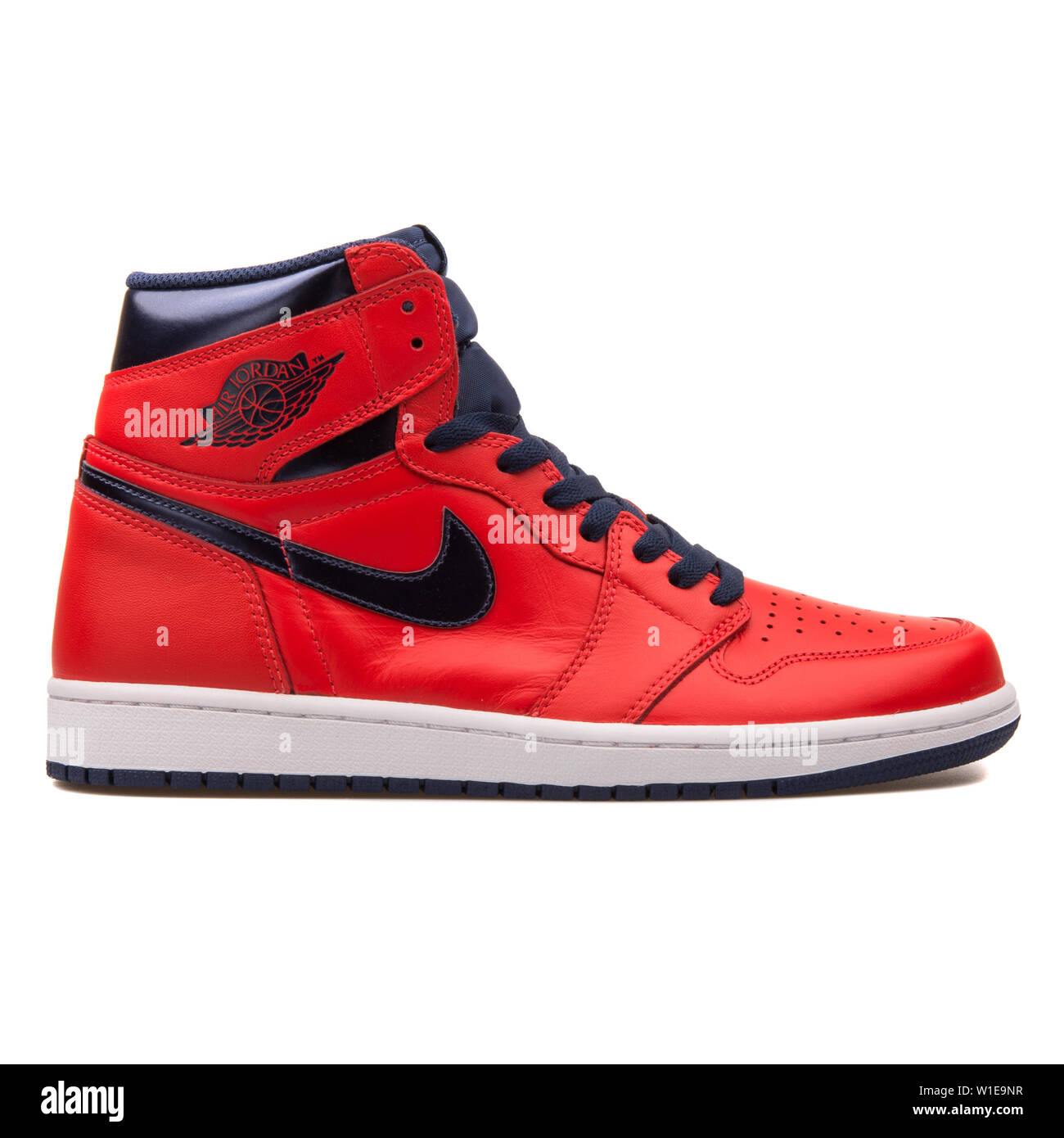 VIENNA, AUSTRIA - JUNE 14, 2017: Nike Air Jordan 1 Retro High OG red and  black sneaker isolated on grey background Stock Photo - Alamy