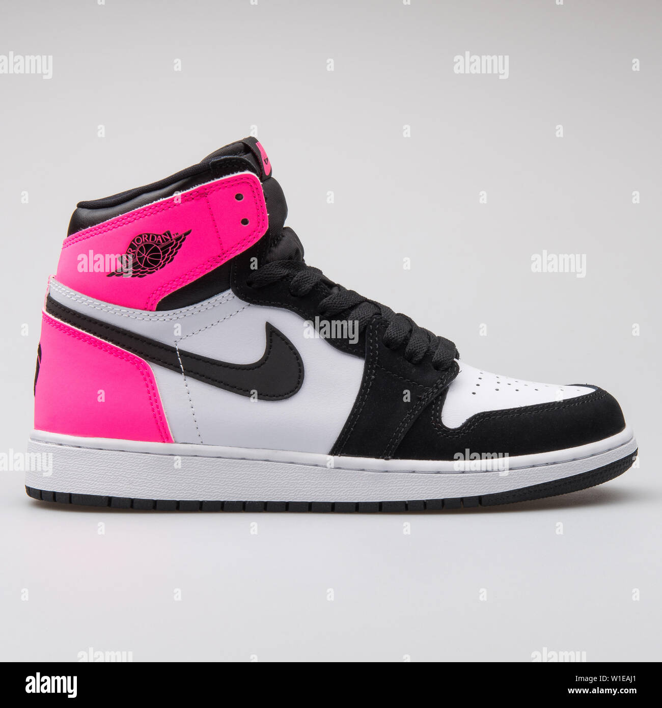 VIENNA, AUSTRIA - JUNE 14, 2017: Nike Air Jordan 1 Retro high OG GG white,  pink and black sneaker isolated on grey background Stock Photo - Alamy