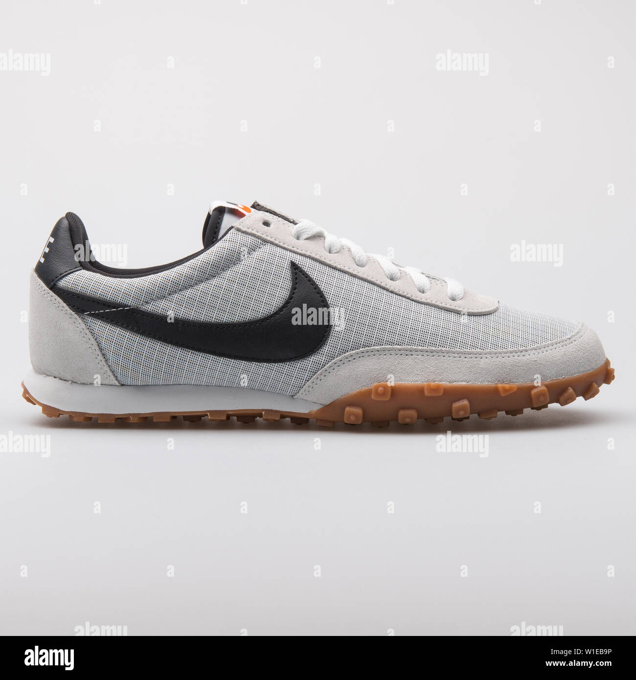 VIENNA, AUSTRIA - AUGUST 7, 2017: Nike Waffle Racer 17 grey, off white and  black sneaker on white background Stock Photo - Alamy