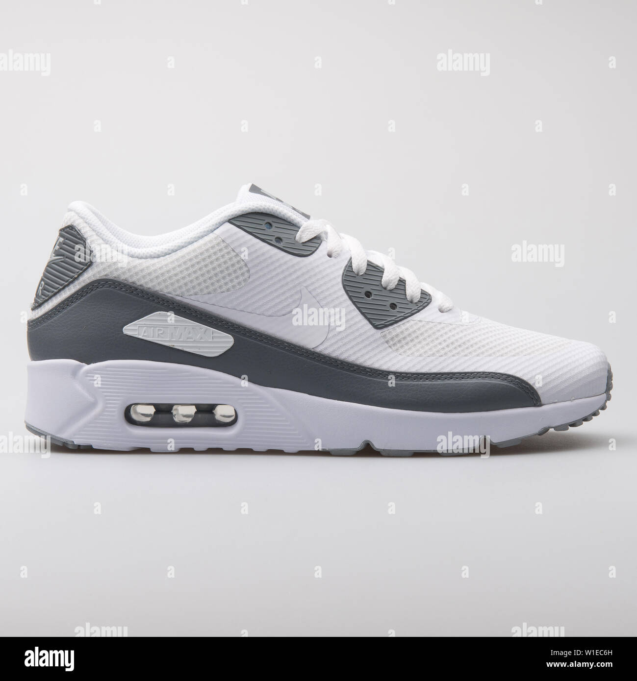 VIENNA, AUSTRIA - AUGUST 7, 2017: Nike Air Max 90 Ultra 2.0 Essential white  and grey sneaker on white background Stock Photo - Alamy