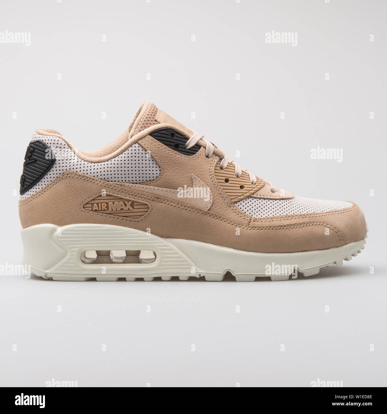 VIENNA, AUSTRIA - AUGUST 7, 2017: Nike Air Max 90 Pinnacle beige sneaker on  white background Stock Photo - Alamy