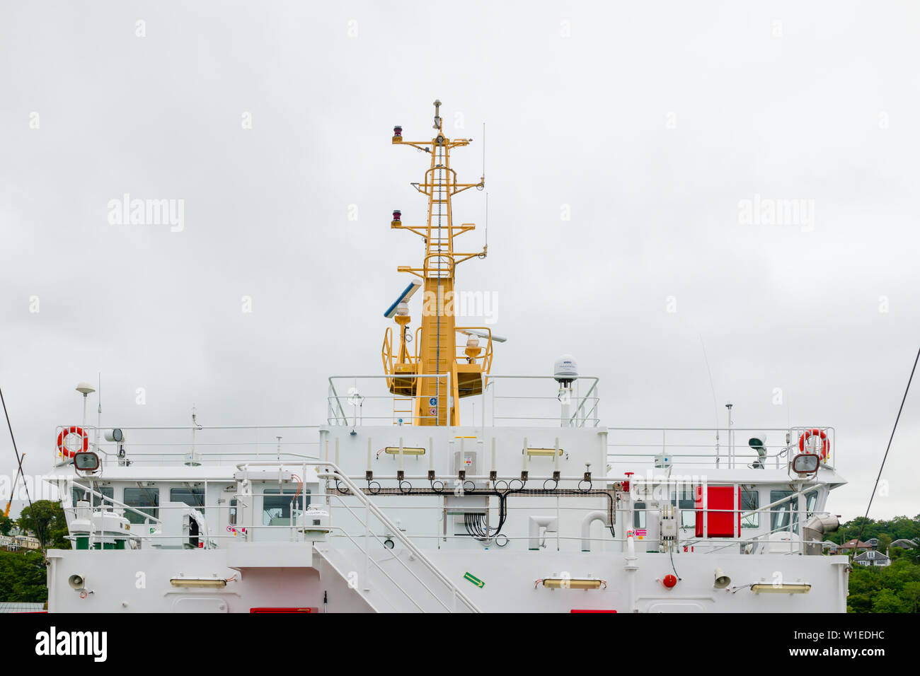 The mast and upper decks of a Calmac car ferry in Scotland Stock Photo