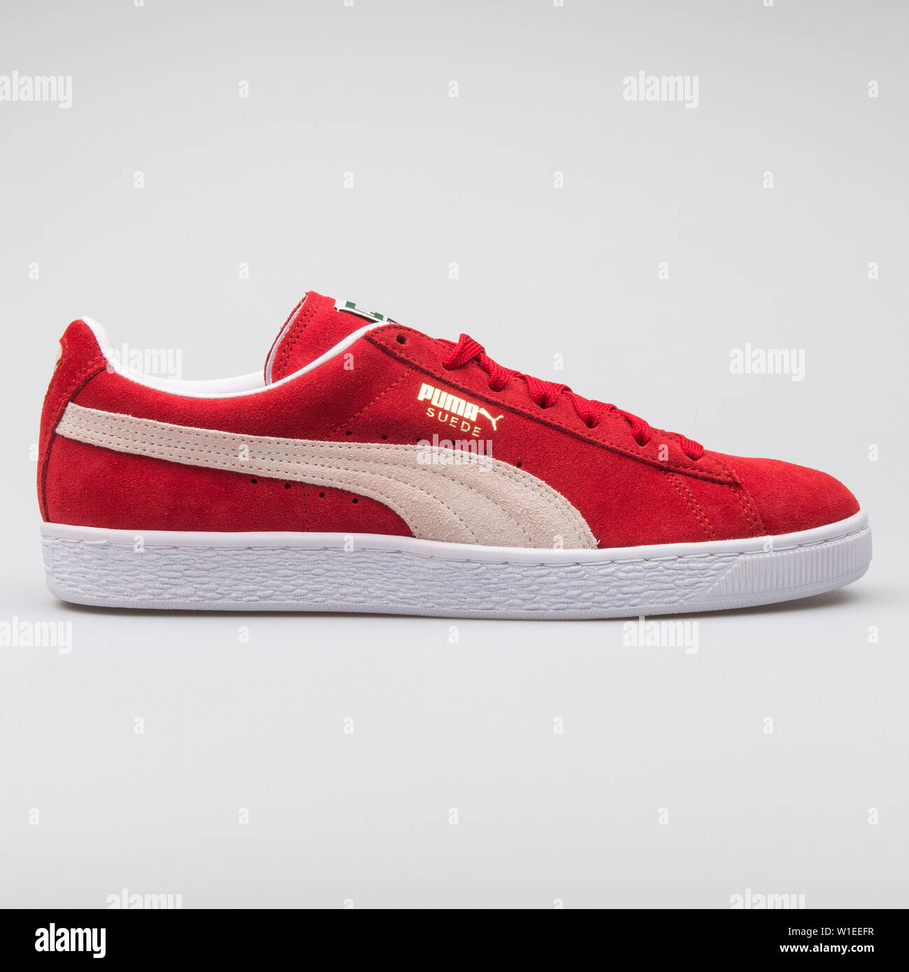 VIENNA, AUSTRIA AUGUST 7, Suede Classic red sneaker on white background Stock Photo - Alamy