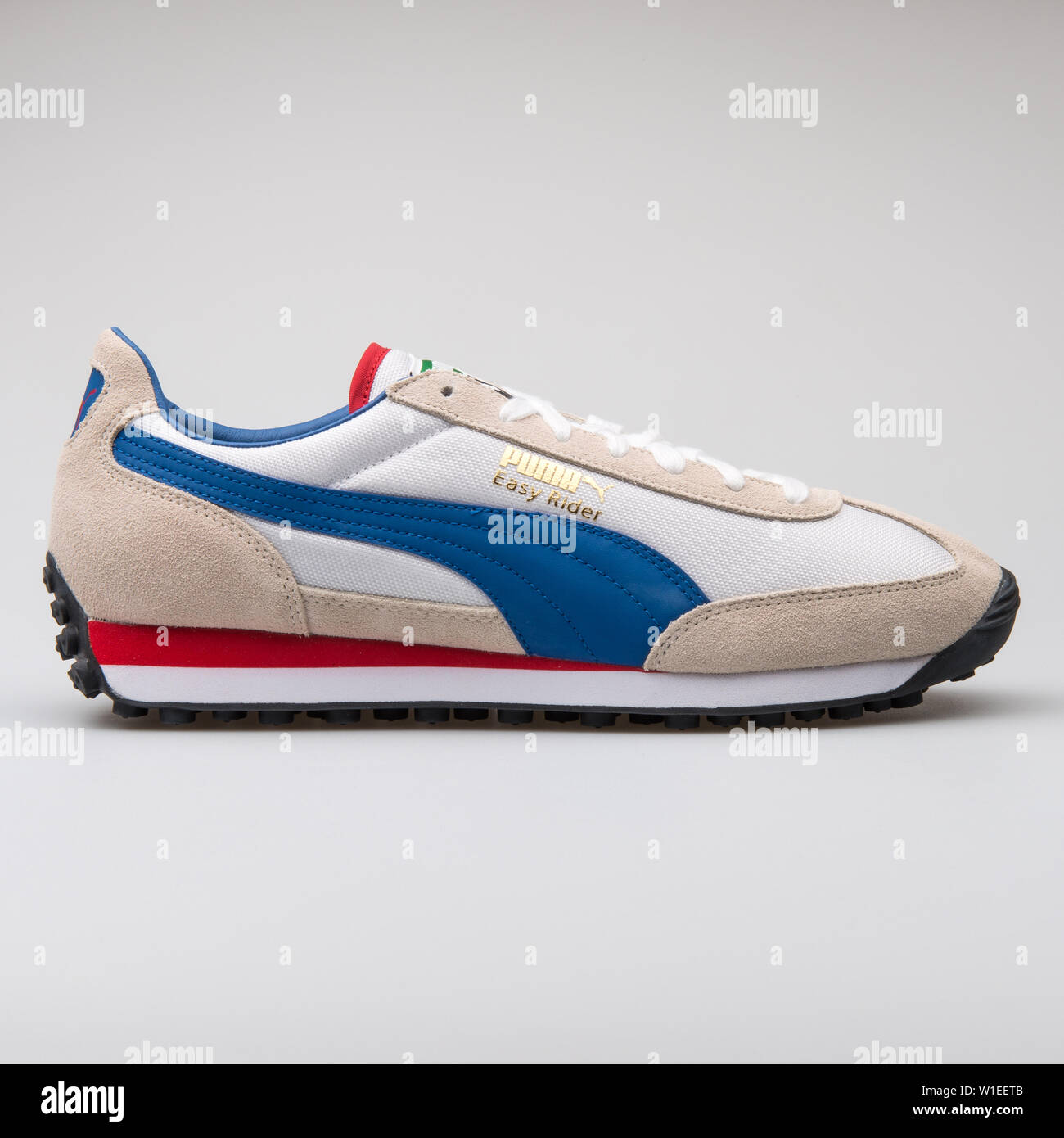 VIENNA, AUSTRIA - AUGUST 7, 2017: Puma Easy Rider white, blue and red  sneaker on white background Stock Photo - Alamy