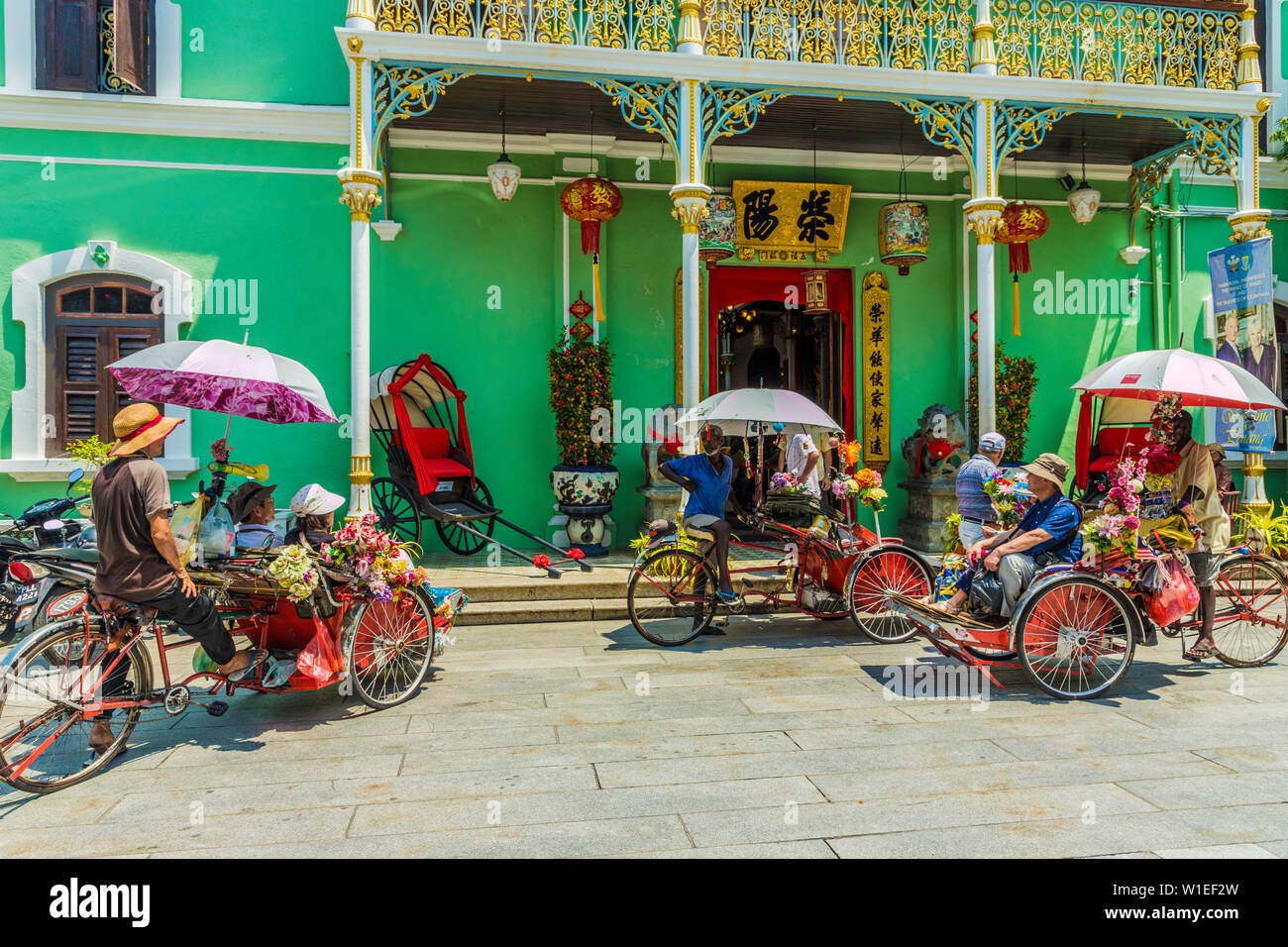 Tourists outside the Pinang Peranakan Mansion, George Town, Penang Island, Malaysia, Southeast Asia, Asia Stock Photo