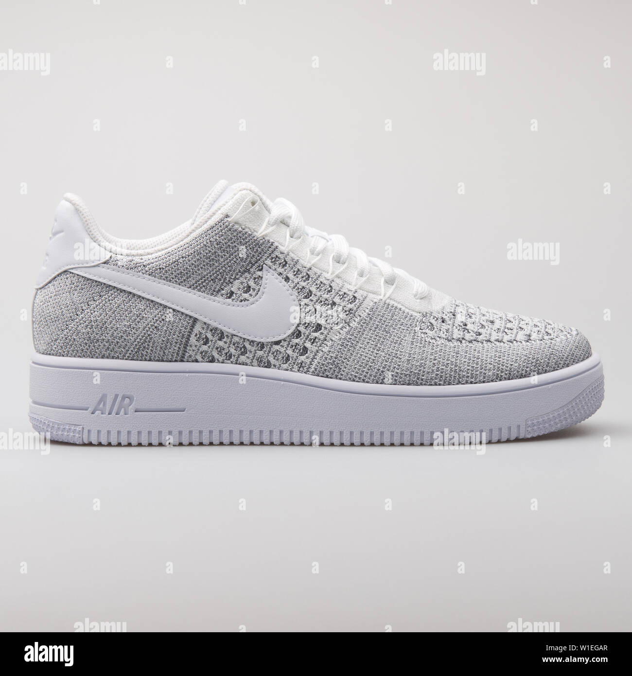 VIENNA, AUSTRIA - AUGUST 7, 2017: Nike Air Force 1 Ultra Flyknit Low grey  sneaker on white background Stock Photo - Alamy
