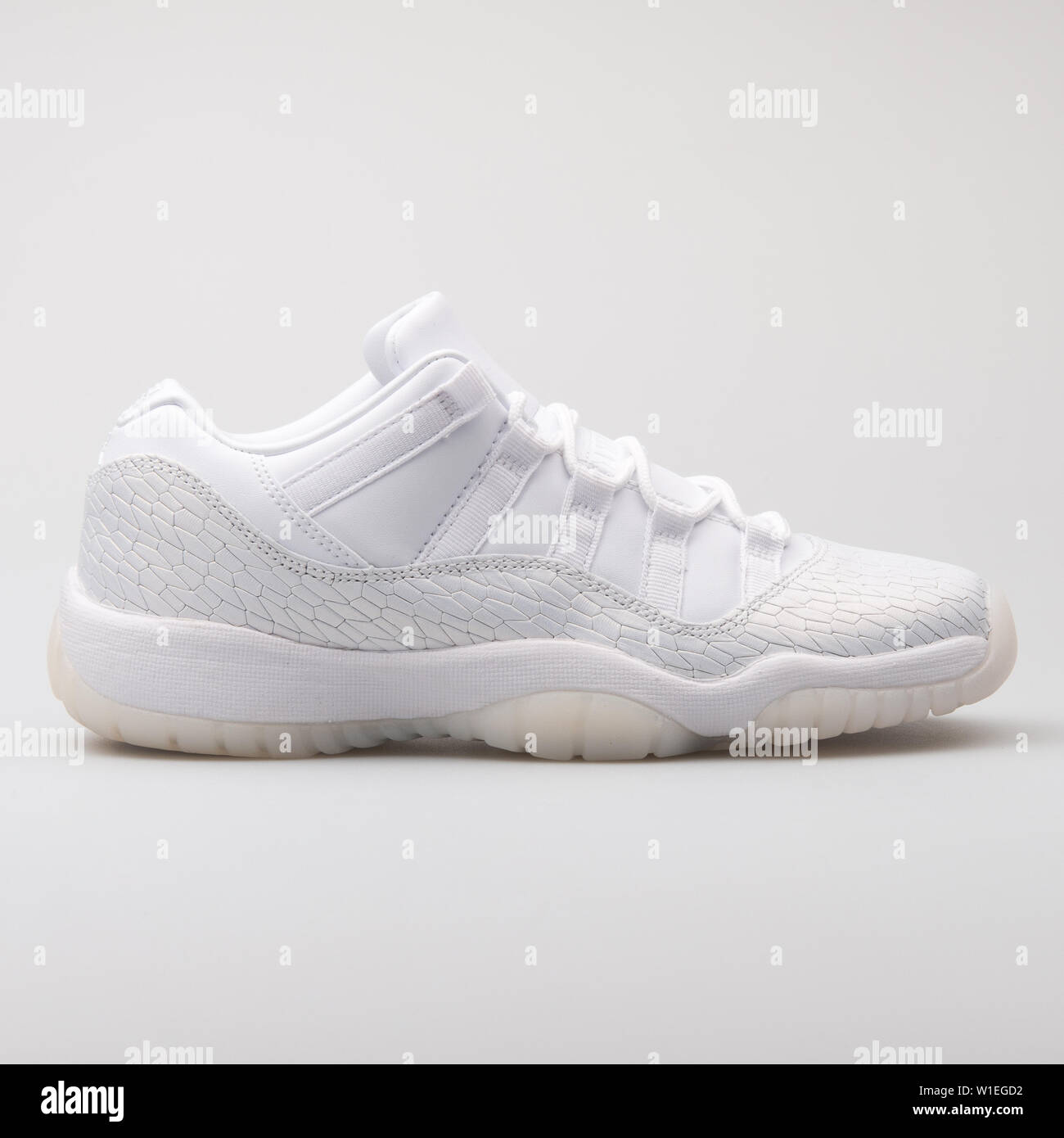 VIENNA, AUSTRIA - AUGUST 7, 2017: Nike Air Jordan 11 Retro Low white  sneaker isolated on white background Stock Photo - Alamy