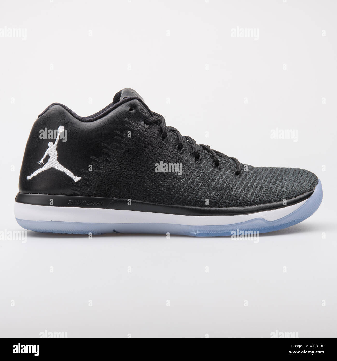 Pair of Blue White Nike Air Jordan Sneakers on a Black Background · Free  Stock Photo