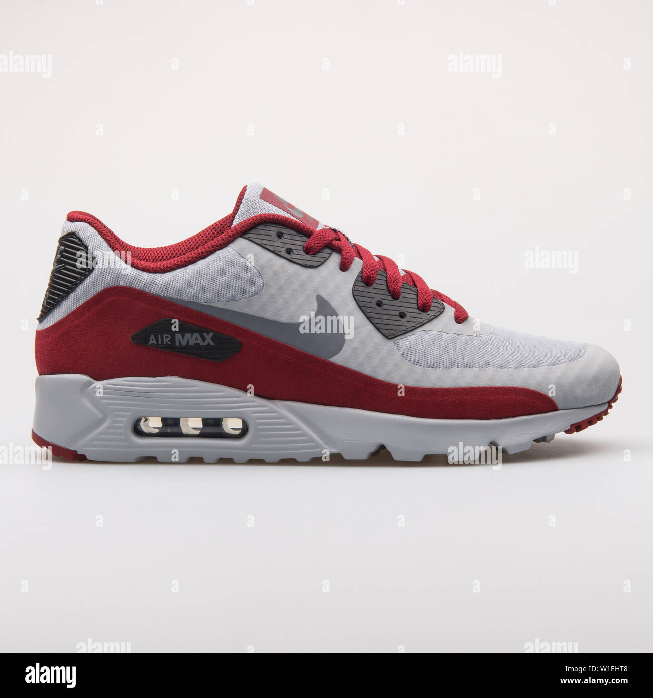 VIENNA, AUSTRIA - AUGUST 23, 2017: Nike Air Max 90 Ultra Essential grey and  red sneaker on white background Stock Photo - Alamy