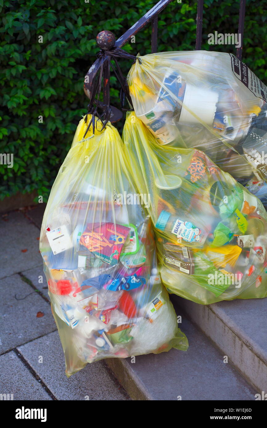 Yellow bags for plastic waste, hanging on a banister, hanging, Bremen