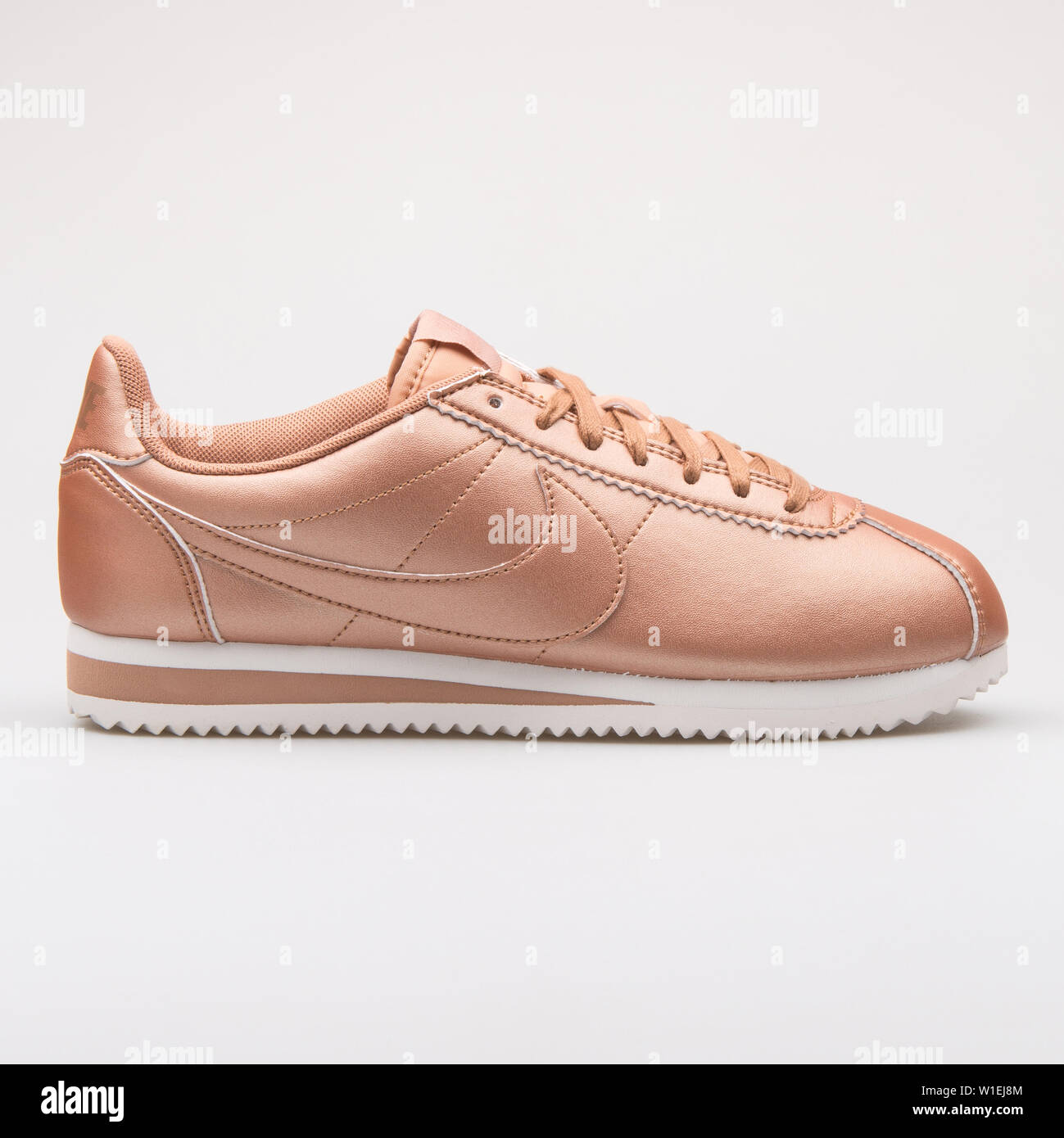 VIENNA, AUSTRIA - AUGUST 23, 2017: Nike Classic Cortez Leather metallic red  bronze sneaker on white background Stock Photo - Alamy