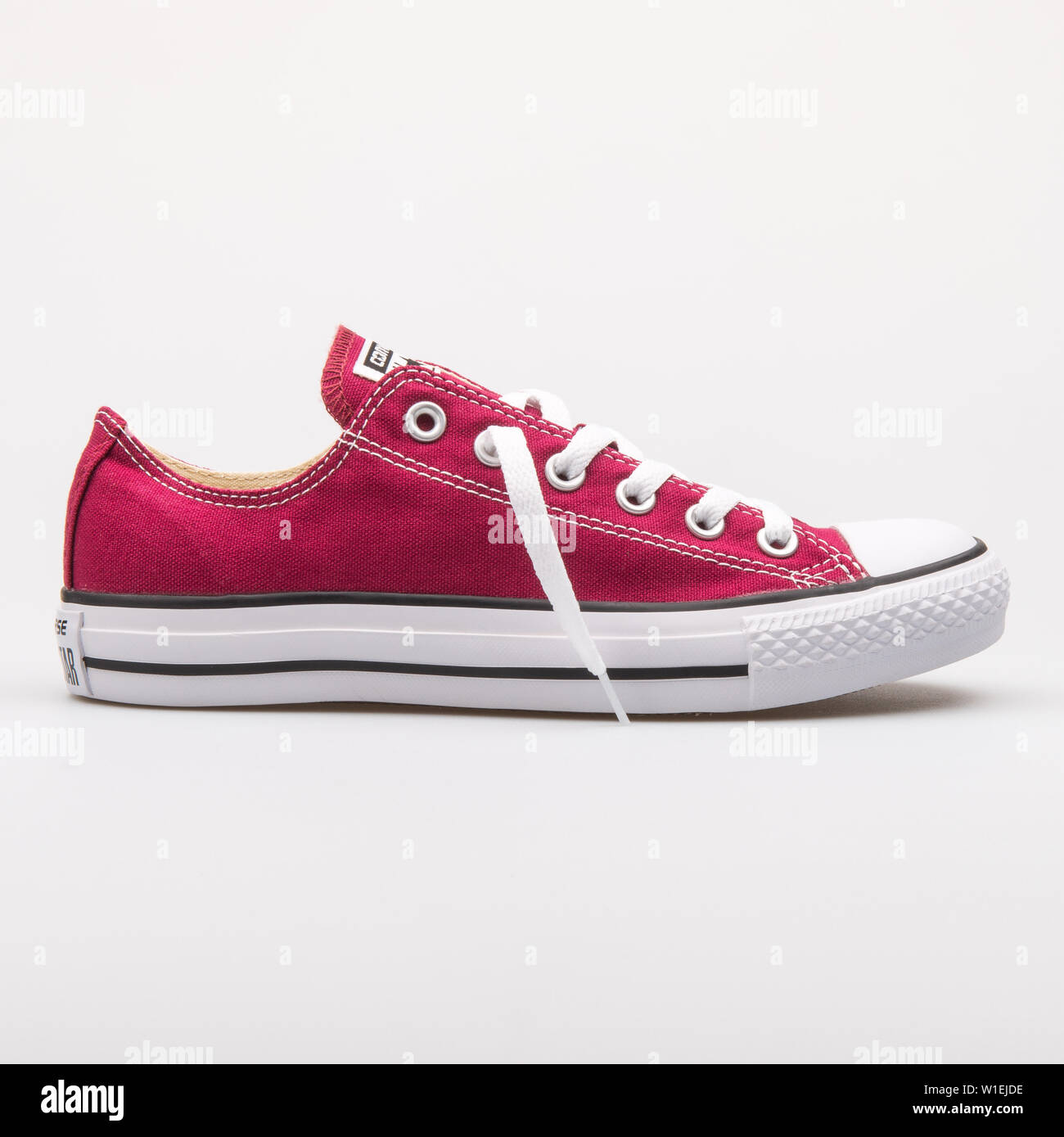 Maroon converse hi-res stock photography and images - Alamy