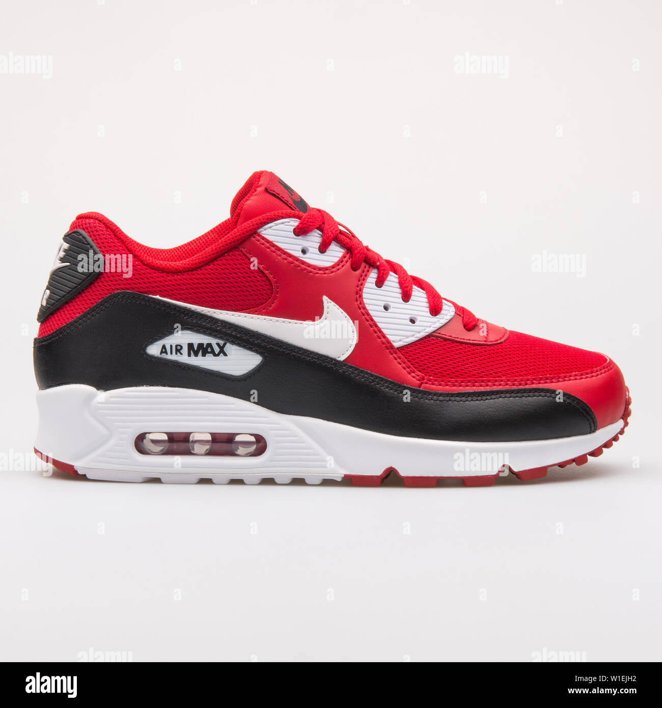VIENNA, AUSTRIA - AUGUST 23, 2017: Nike Air Max 90 Essential red, black and  white sneaker on white background Stock Photo - Alamy