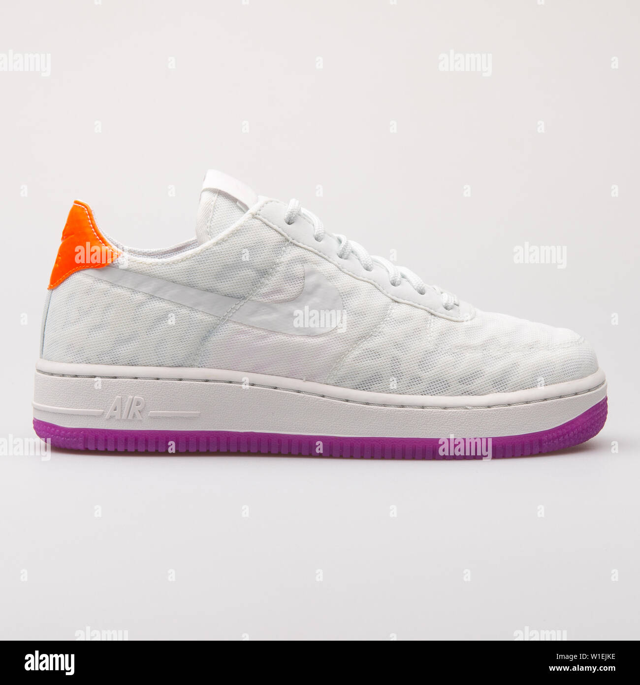 VIENNA, AUSTRIA - AUGUST 23, 2017: Nike Air Force 1 07 TXT Premium off  white and violet sneaker on white background Stock Photo - Alamy