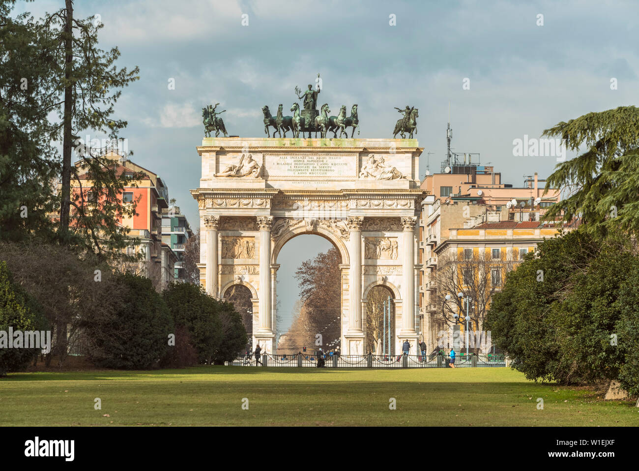 Triumphal arch with bas-reliefs and statues, built by Luigi Cagnola at the request of Napoleon, Milan, Lombardy, Italy, Europe Stock Photo