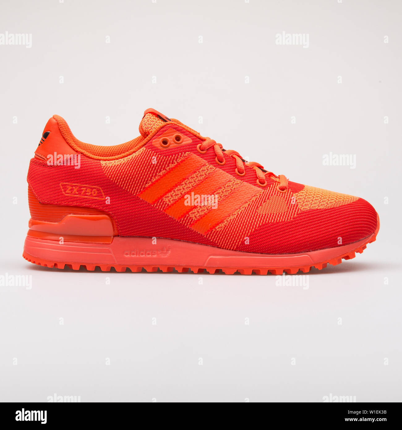 VIENNA, AUSTRIA - AUGUST 28, 2017: Adidas ZX 750 WV solar red sneaker on  white background Stock Photo - Alamy