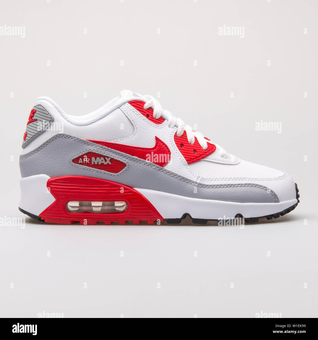 VIENNA, AUSTRIA - AUGUST 28, 2017: Nike Air Max 90 Leather white, grey and  red sneaker on white background Stock Photo - Alamy