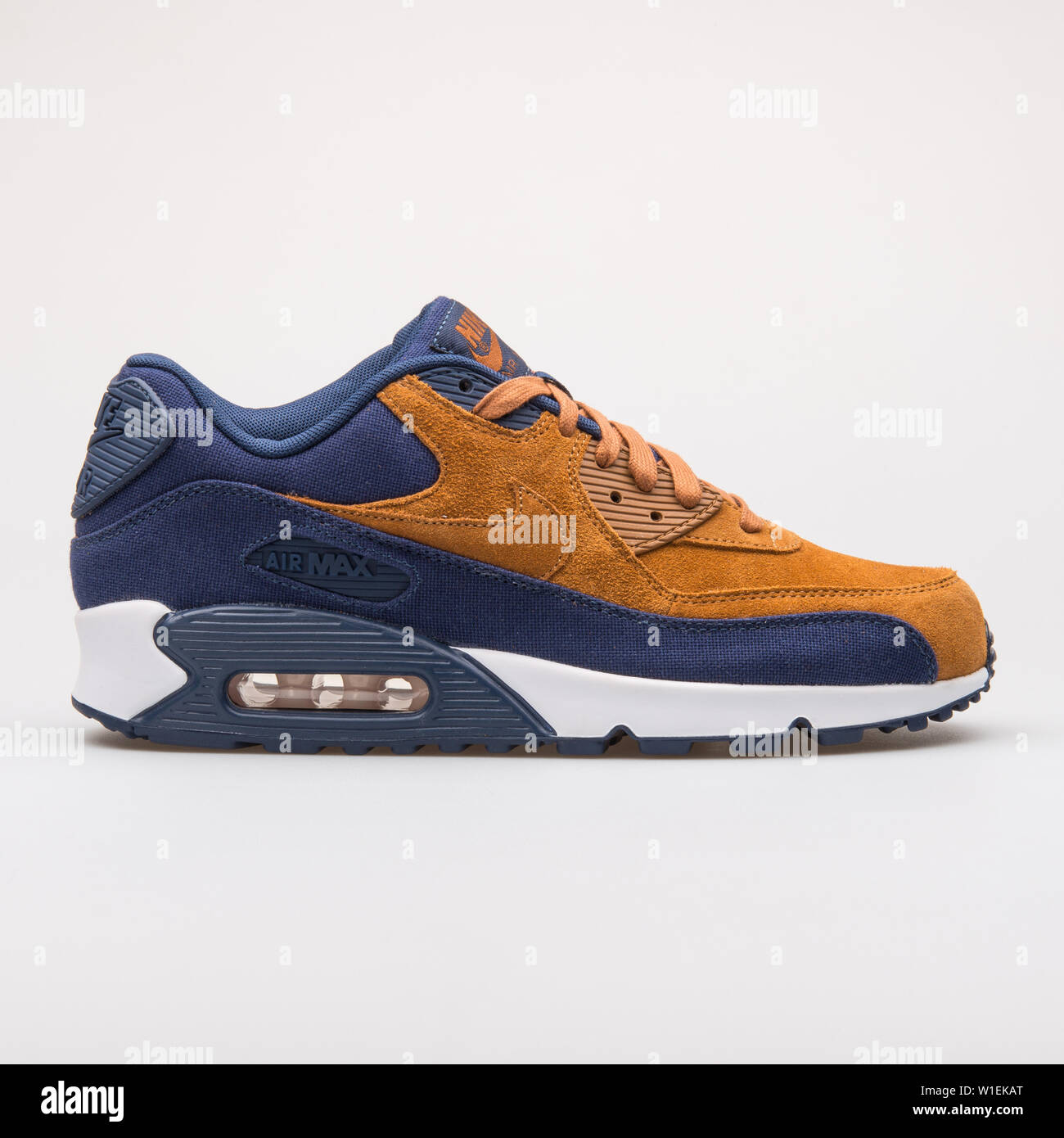 VIENNA, AUSTRIA - AUGUST 28, 2017: Nike Air Max 90 Premium navy blue and  brown sneaker on white background Stock Photo - Alamy