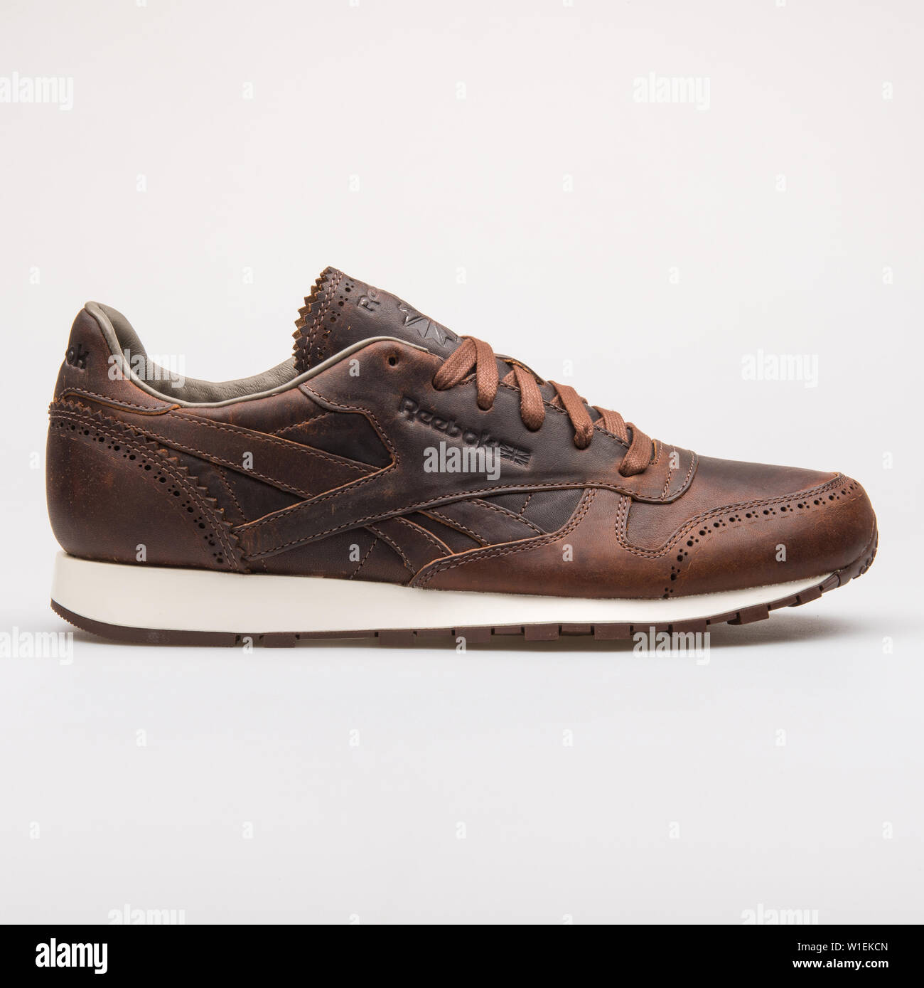 Lurk Descriptive ball VIENNA, AUSTRIA - AUGUST 28, 2017: Reebok Classic Leather Lux Horween brown  sneaker on white background Stock Photo - Alamy