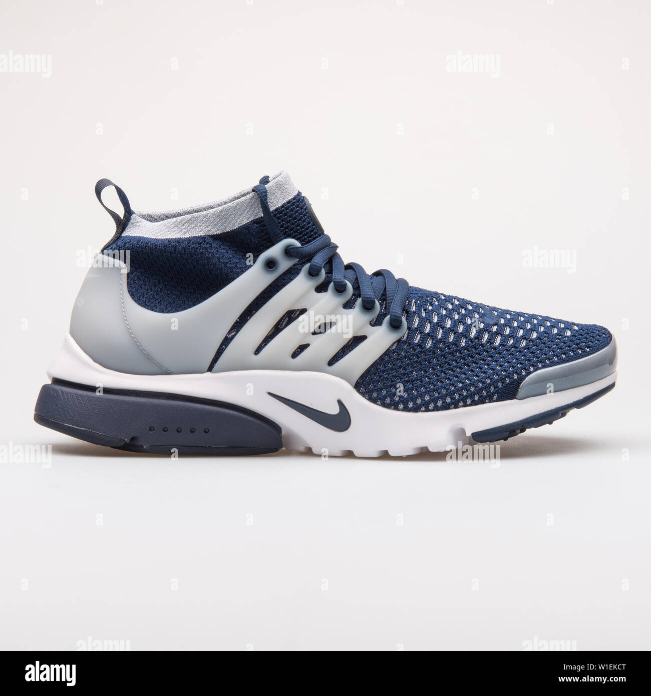 Nike blue and grey trainers hi-res stock photography and images - Alamy