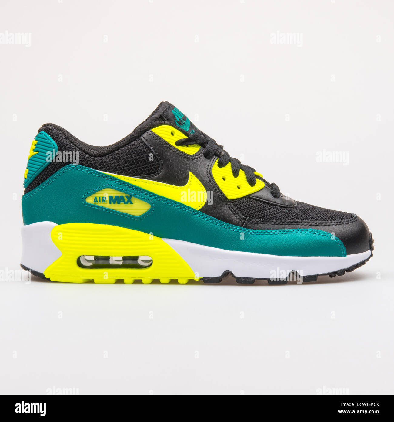 VIENNA, AUSTRIA - AUGUST 28, 2017: Nike Air Max 90 Mesh black, yellow and  green sneaker on white background Stock Photo - Alamy