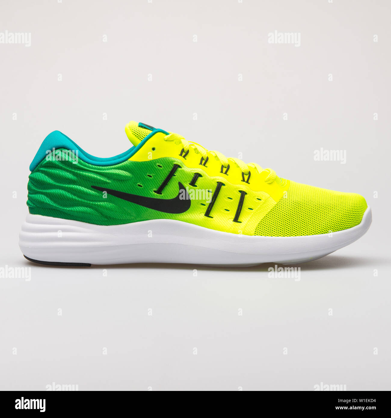 VIENNA, AUSTRIA - AUGUST 28, 2017: Nike Lunarstelos yellow and green  sneaker on white background Stock Photo - Alamy