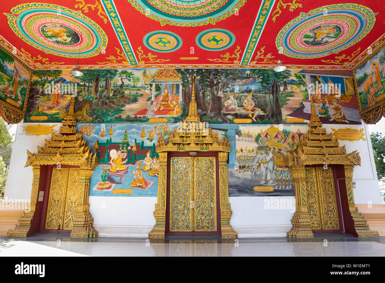 Murals and golden doors at the entrance of the Wat Inpeng Buddhist temple, Rue Samsenthai, Vientiane, Laos, Indochina, Southeast Asia, Asia Stock Photo