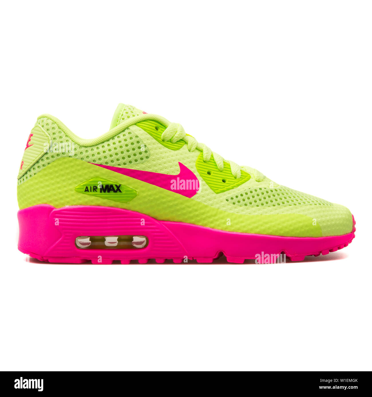 VIENNA, AUSTRIA - AUGUST 30, 2017: Nike Air Max 90 BR green and pink sneaker on white background. Stock Photo