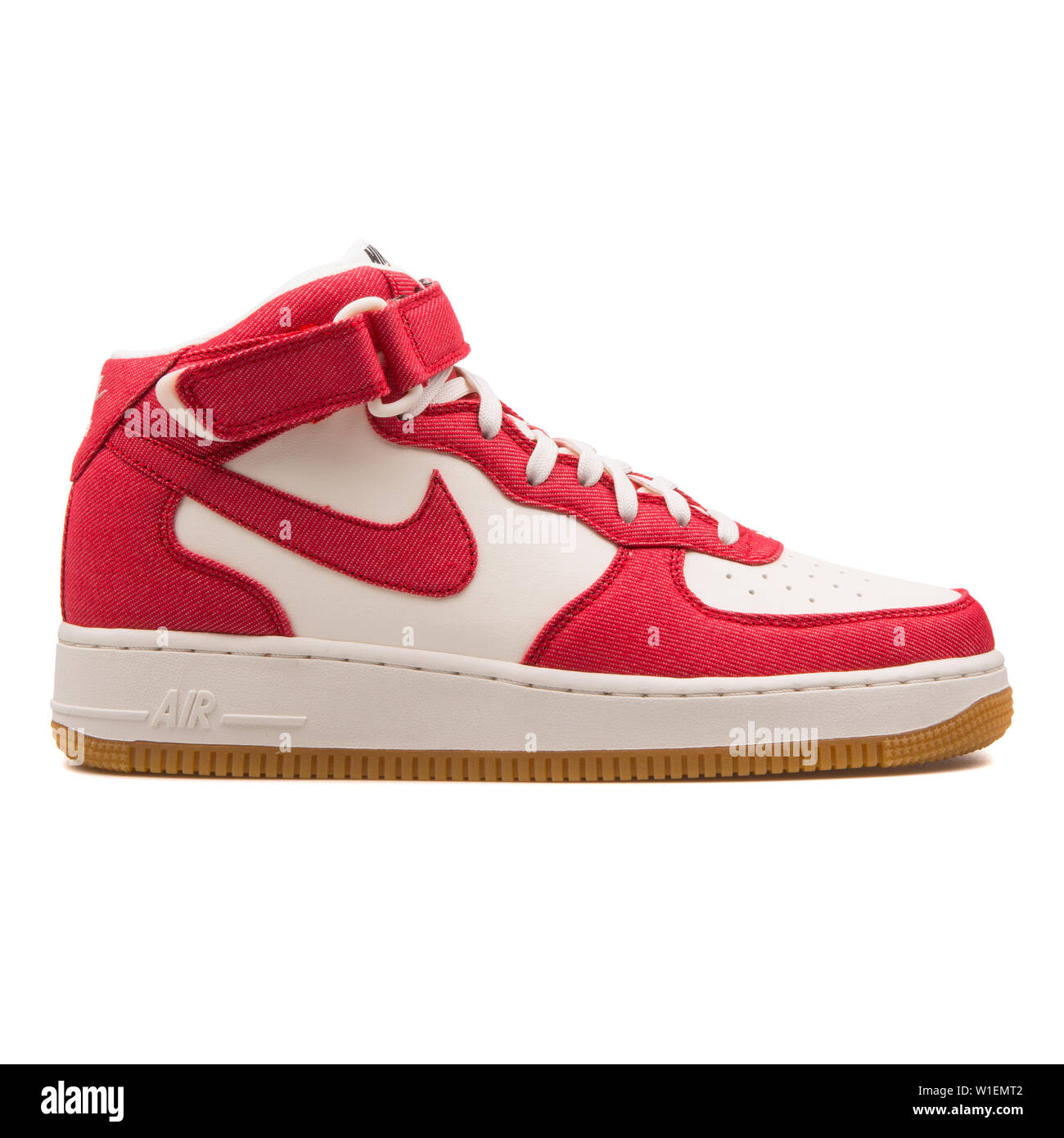 VIENNA, AUSTRIA - AUGUST 30, 2017: Nike Air Force 1 Mid 07 red and off  white sneaker on white background Stock Photo - Alamy