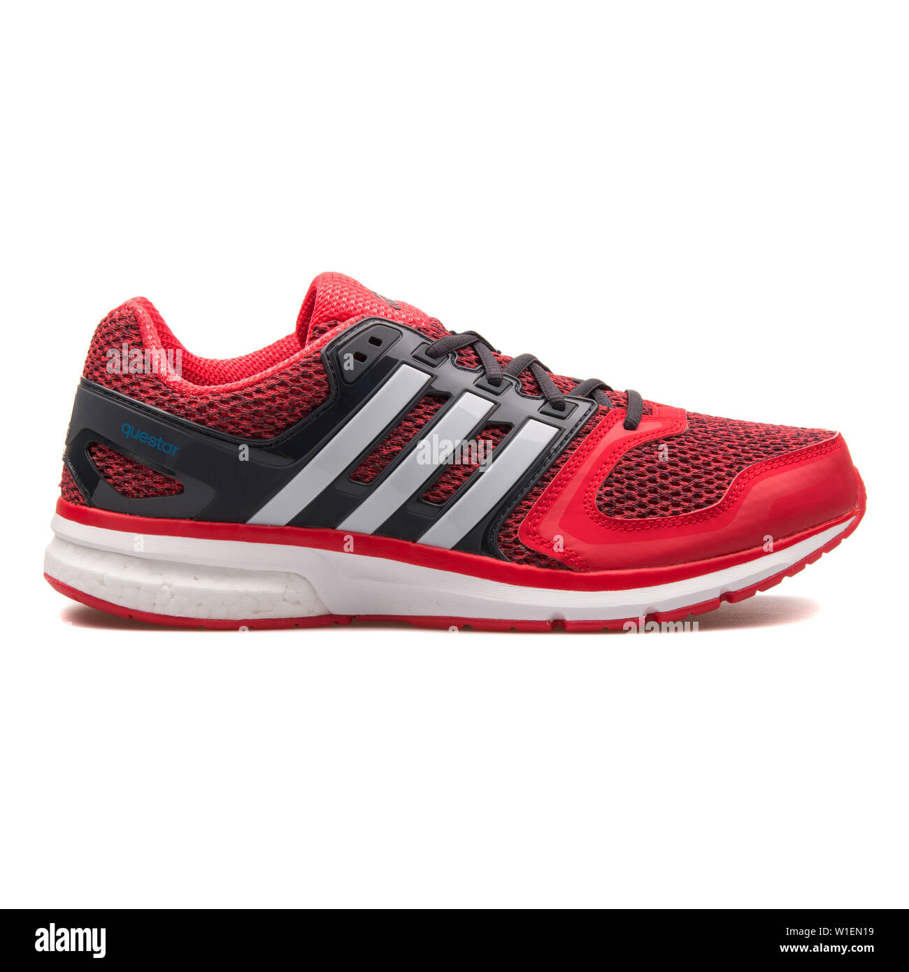 VIENNA, AUSTRIA - AUGUST 30, 2017: Adidas Questar red and black sneaker on  white background Stock Photo - Alamy