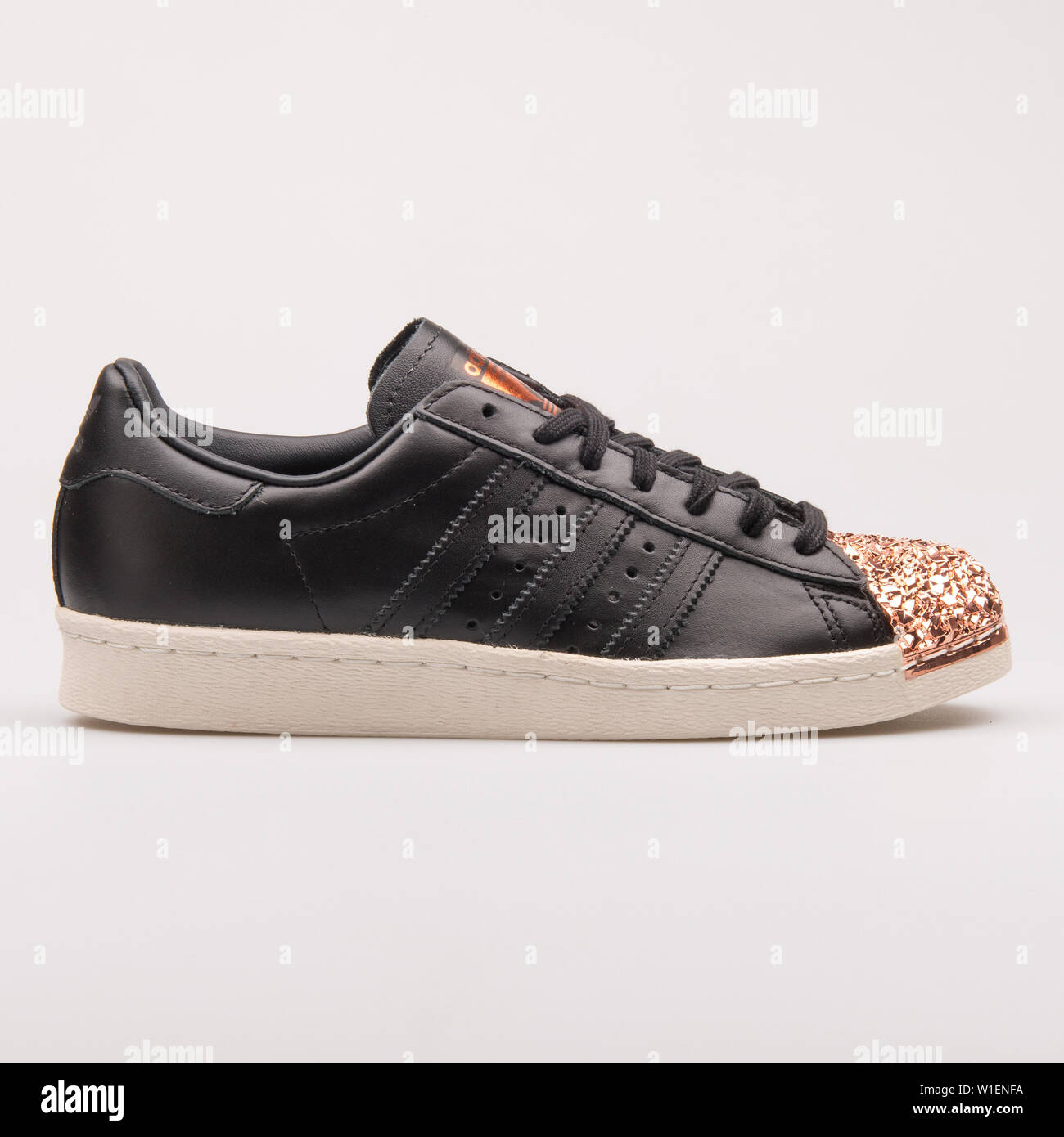 VIENNA, AUSTRIA - AUGUST 30, 2017: Adidas Superstar 80s Metal Toe black and  copper sneaker on white background Stock Photo - Alamy