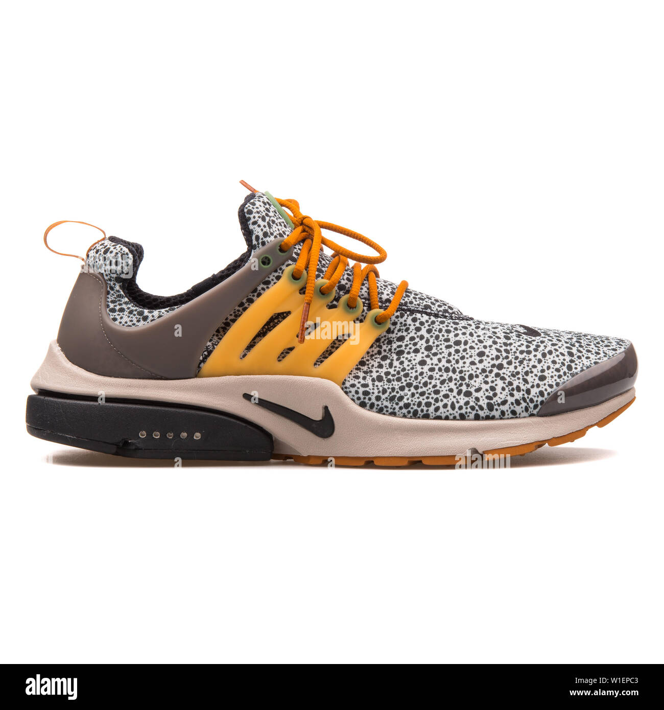 VIENNA, AUSTRIA - AUGUST 10, 2017: Nike Air Presto SE QS black, grey and  yellow sneaker on white background Stock Photo - Alamy