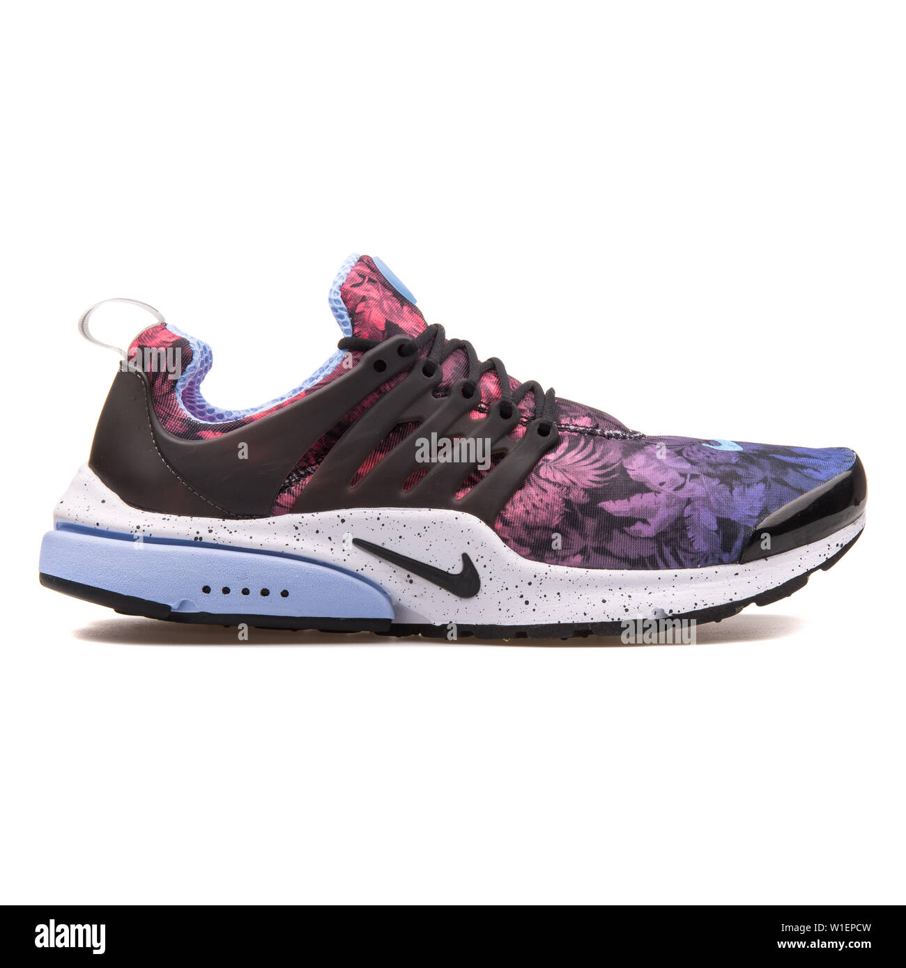 VIENNA, AUSTRIA - AUGUST 10, 2017: Nike Air Presto GPX black and purple  sneaker on white background Stock Photo - Alamy