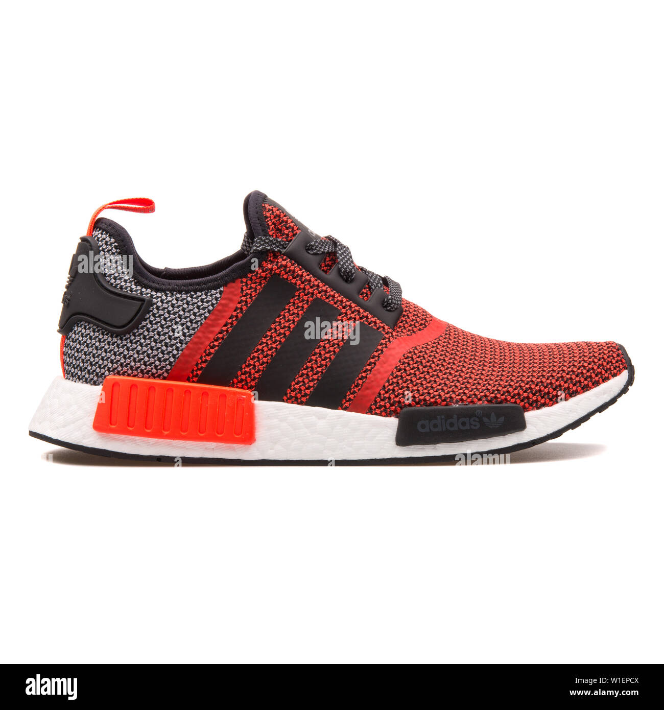 VIENNA, AUSTRIA - AUGUST 10, 2017: Adidas NMD R1 red and black sneaker on  white background Stock Photo - Alamy