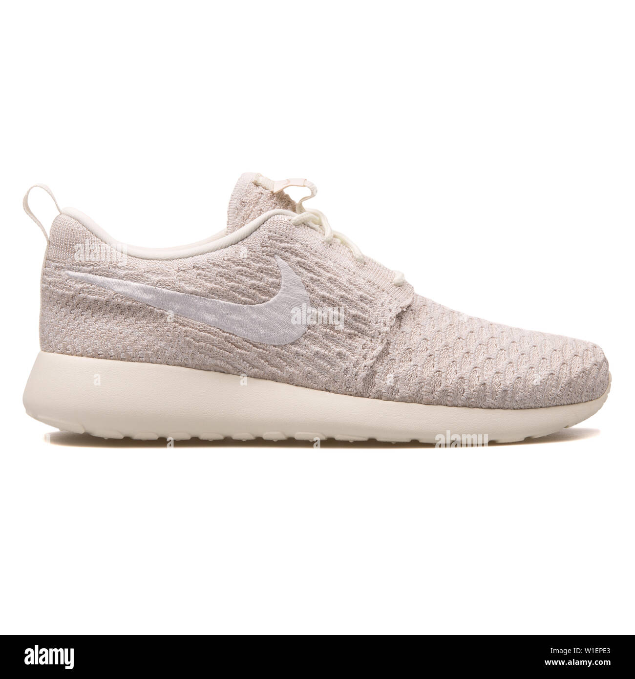 VIENNA, AUSTRIA - AUGUST 10, 2017: Nike Roshe One Flyknit sail white  sneaker on white background Stock Photo - Alamy