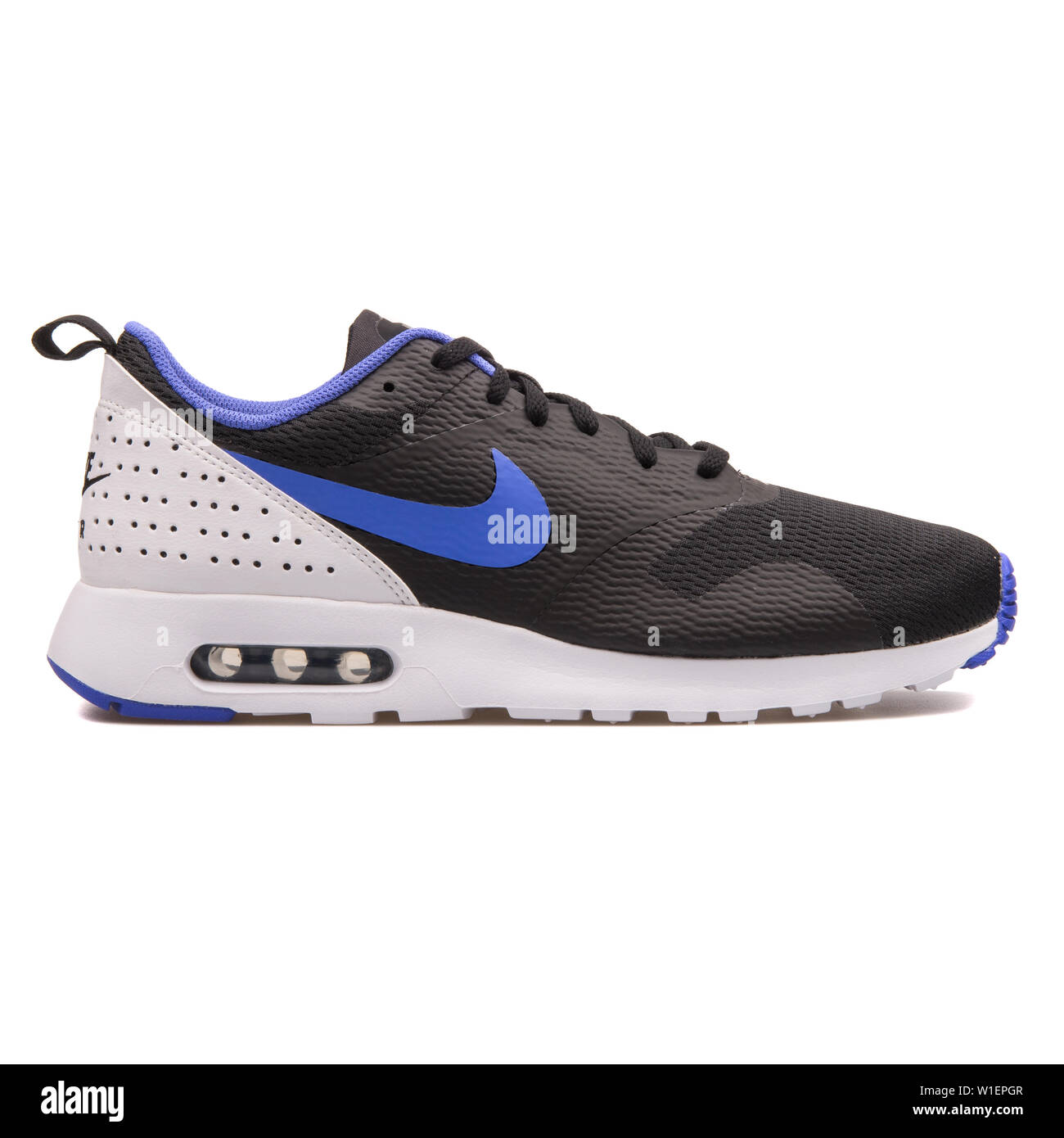 VIENNA, AUSTRIA - AUGUST 10, 2017: Nike Air Max Tavas black, violet and  white sneaker on white background Stock Photo - Alamy