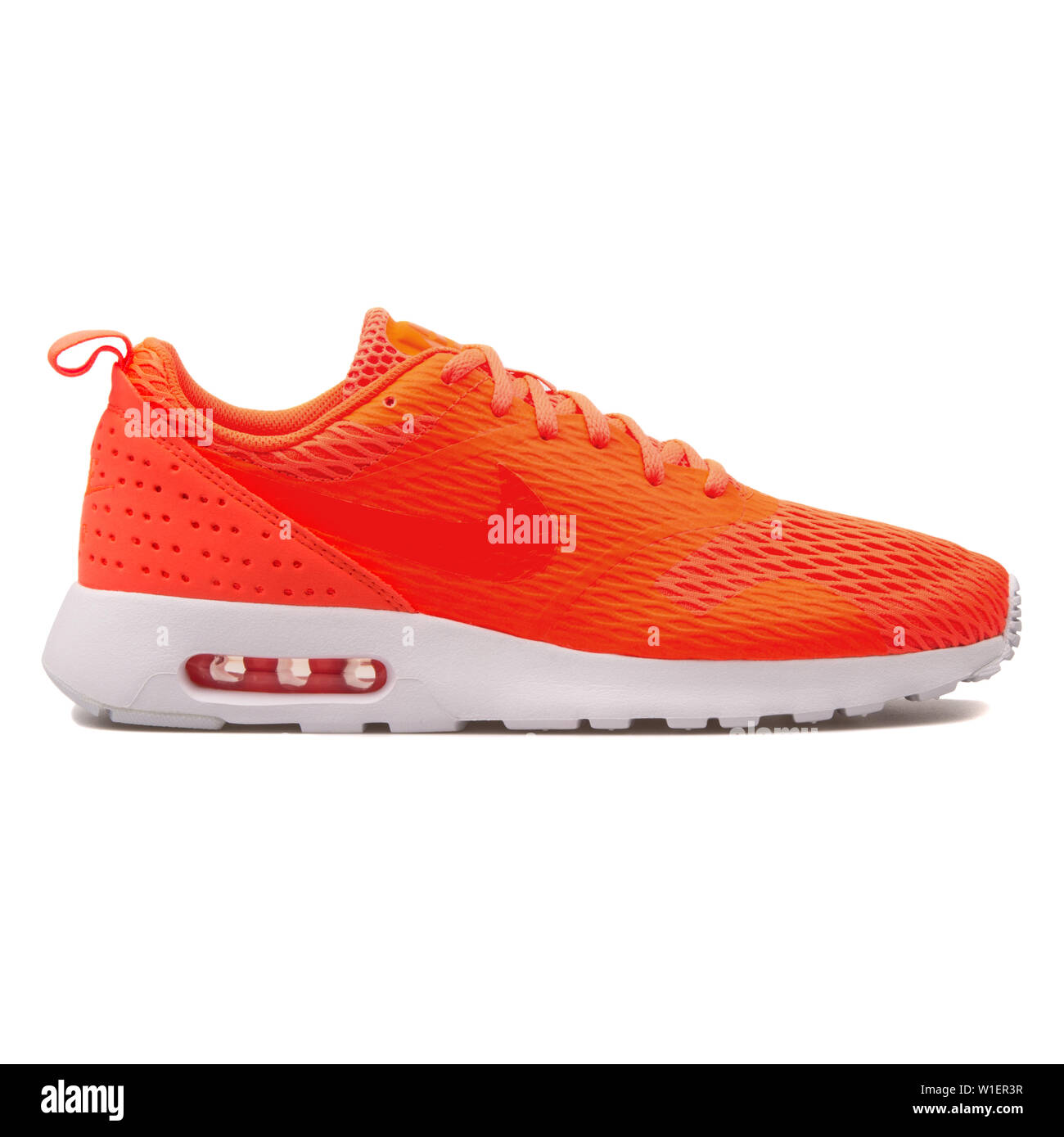 VIENNA, AUSTRIA - AUGUST 10, 2017: Nike Air Max Tavas SE total crimson  sneaker on white background Stock Photo - Alamy