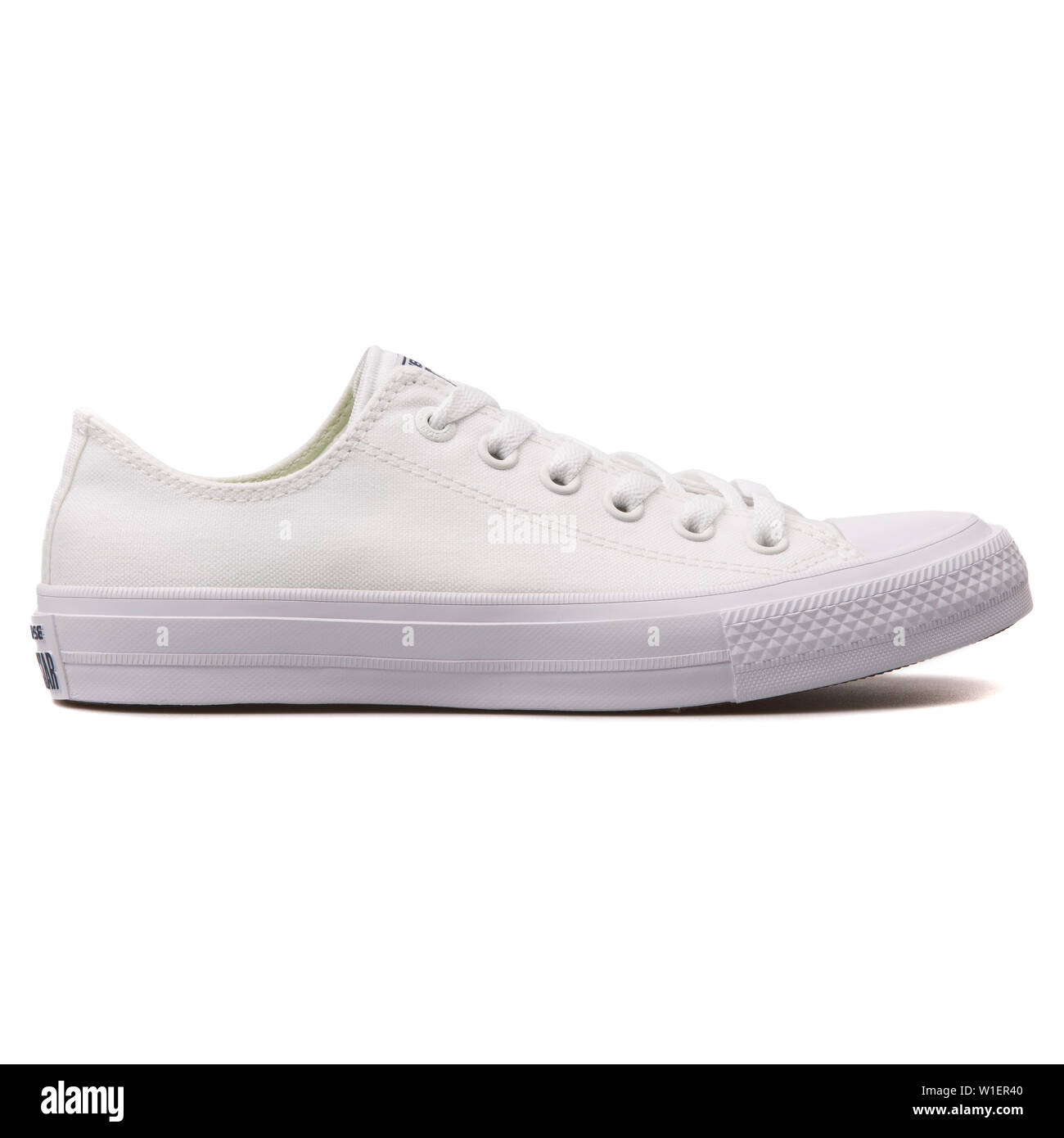 White converse sneakers hi-res stock photography and images - Page 14 -  Alamy