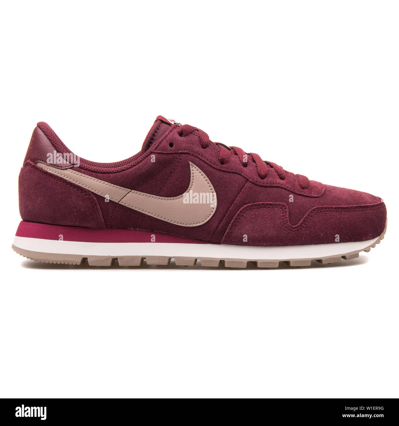 Maroon Nike Trainers High Resolution Stock Photography and Images - Alamy