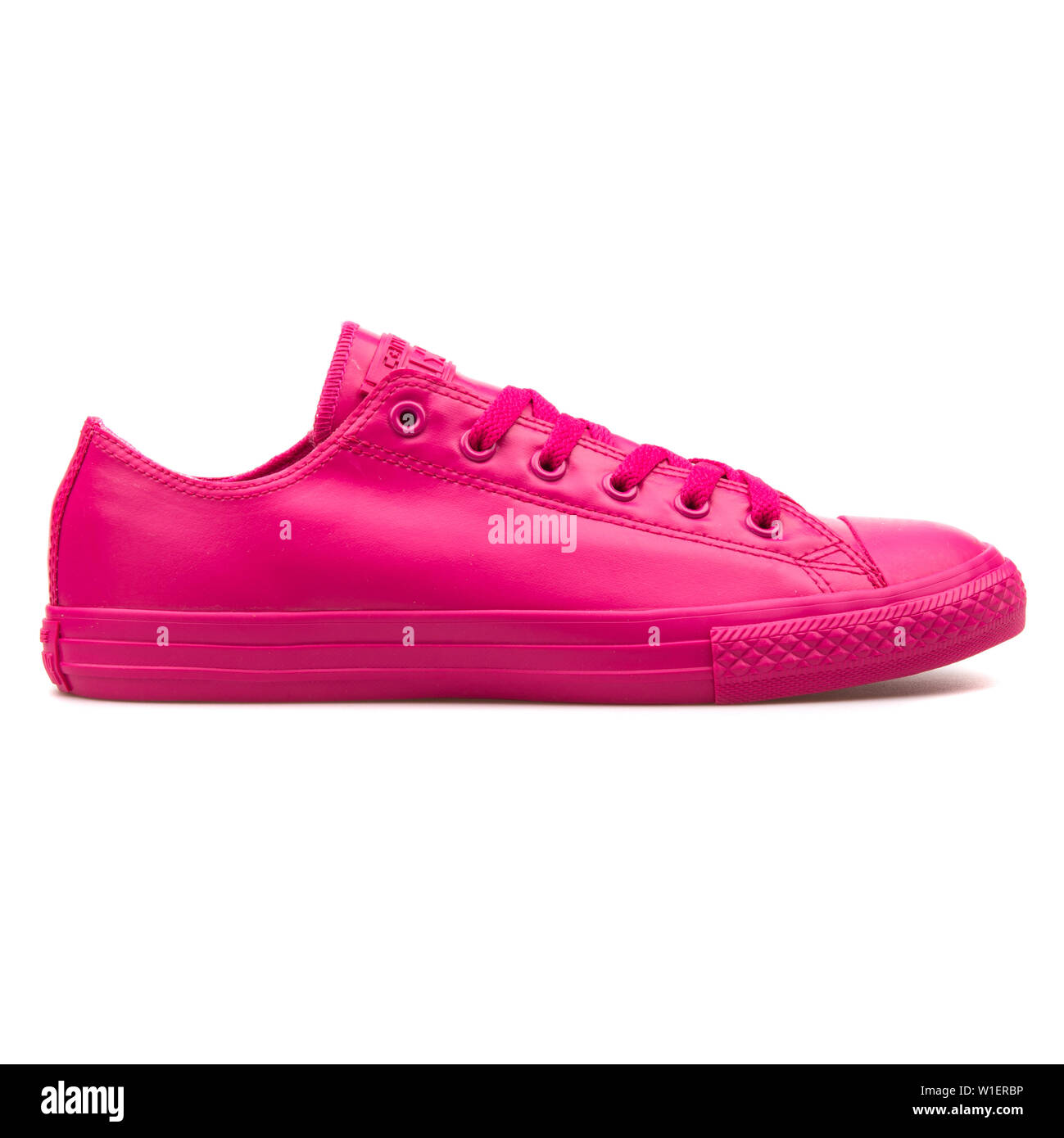 VIENNA, AUSTRIA - AUGUST 10, 2017: Converse Chuck Taylor All Star Rubber OX  cosmos pink sneaker on white background Stock Photo - Alamy