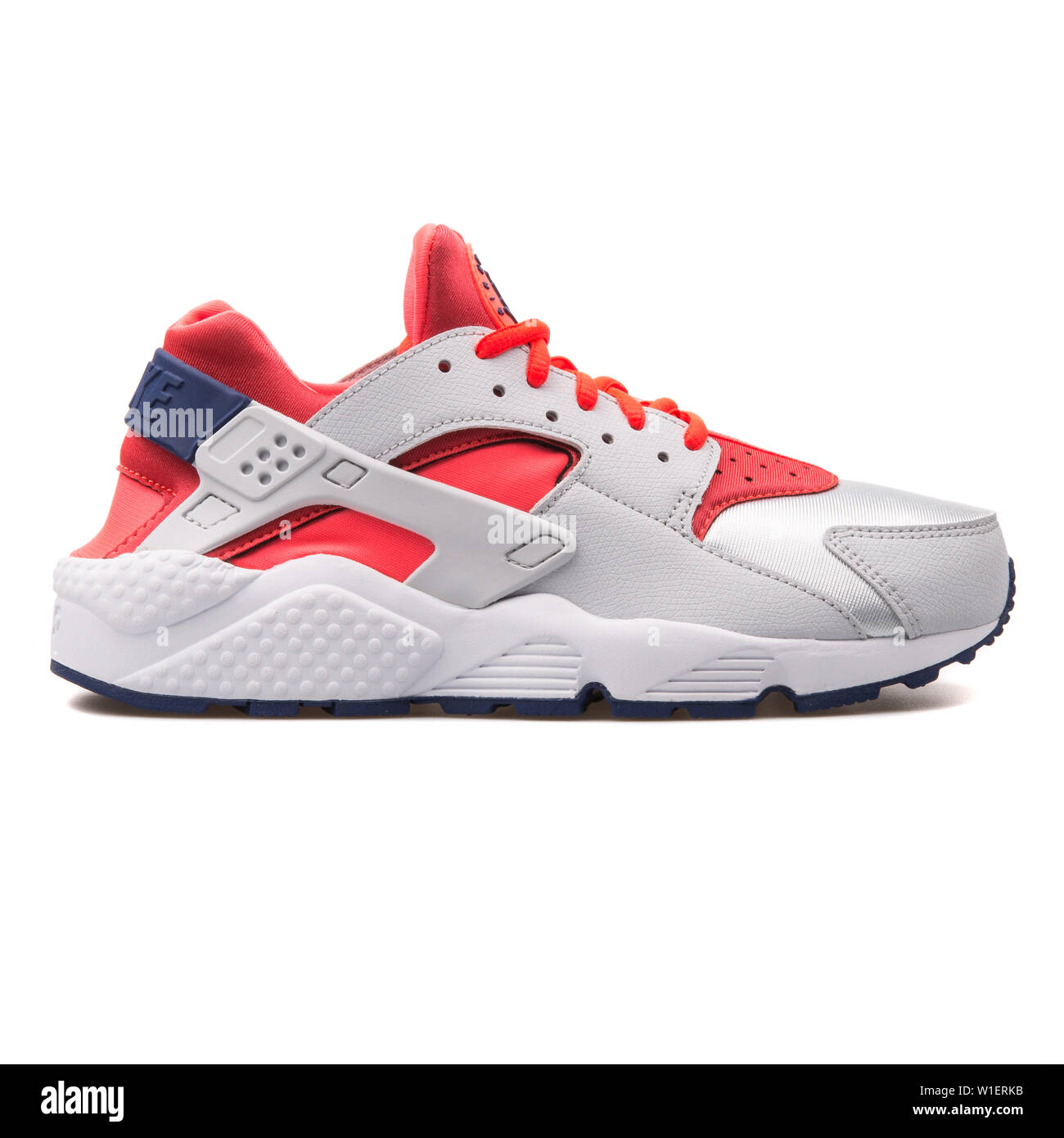 VIENNA, AUSTRIA - AUGUST 10, 2017: Nike Air Huarache Run grey and red  sneaker on white background Stock Photo - Alamy