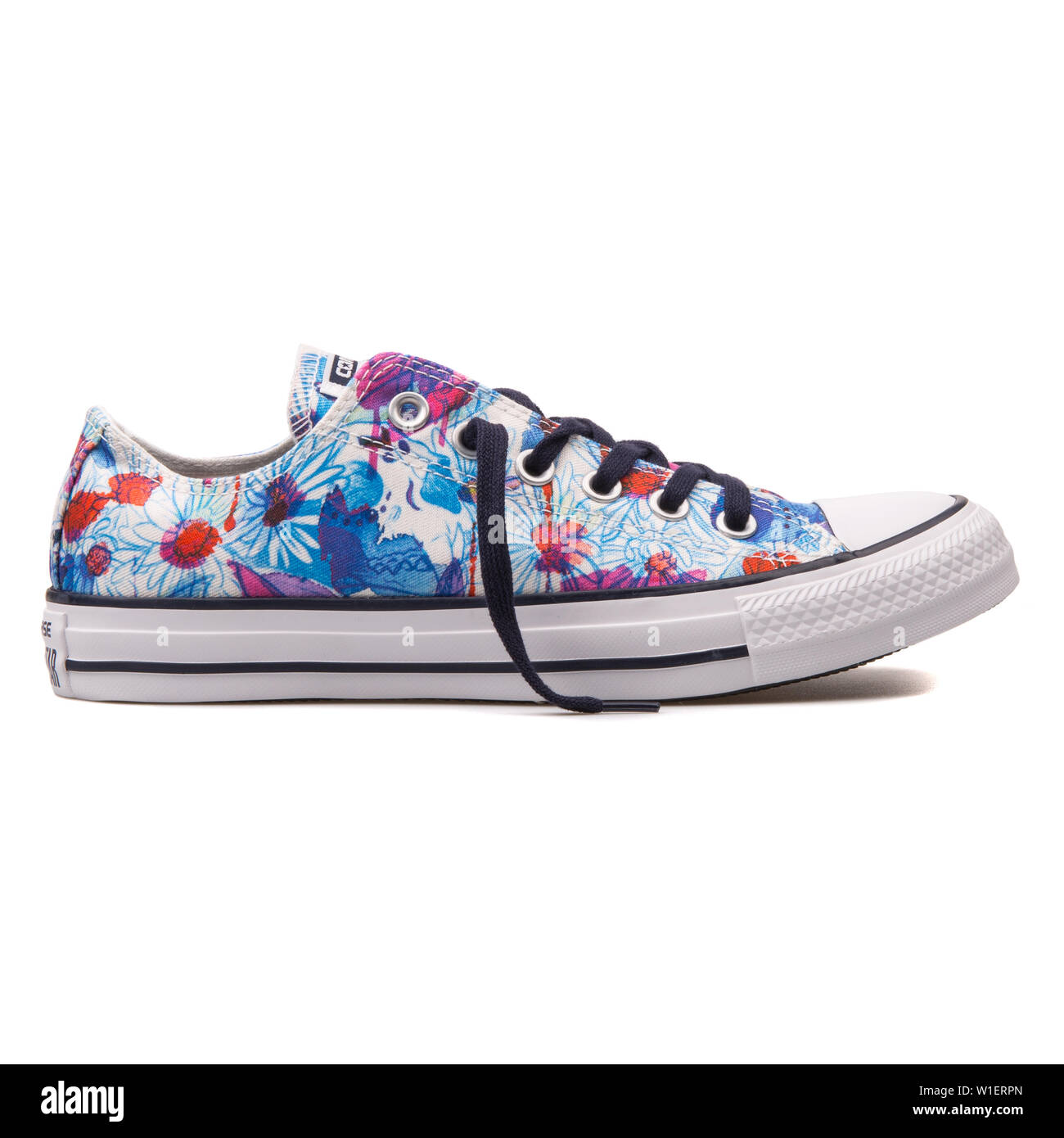 VIENNA, AUSTRIA - AUGUST 10, 2017: Converse Chuck Taylor All Star OX spray  paint floral sneaker on white background Stock Photo - Alamy