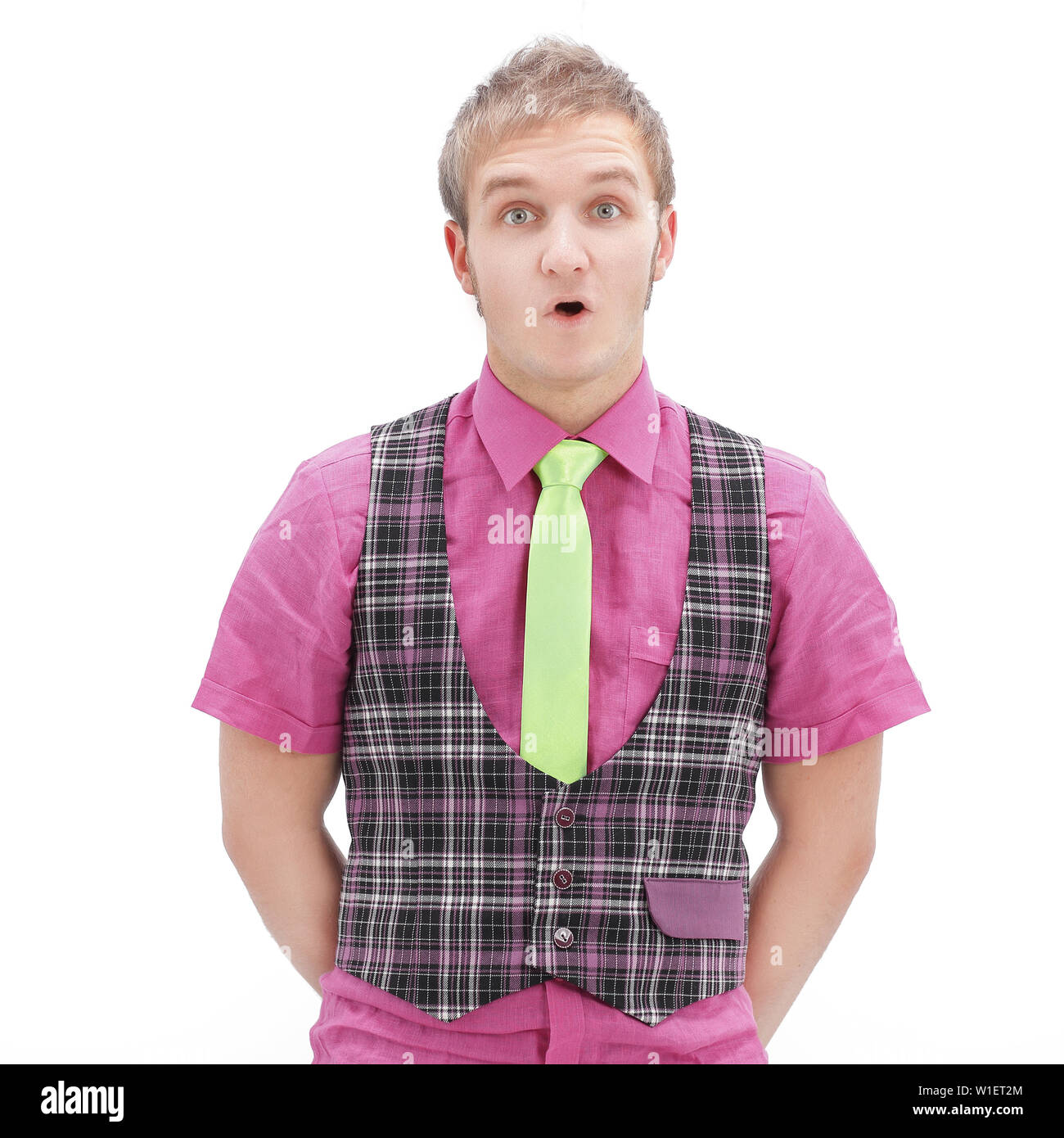 surprised young man in a plaid jacket and bright shirt.isolated on a white background. Stock Photo