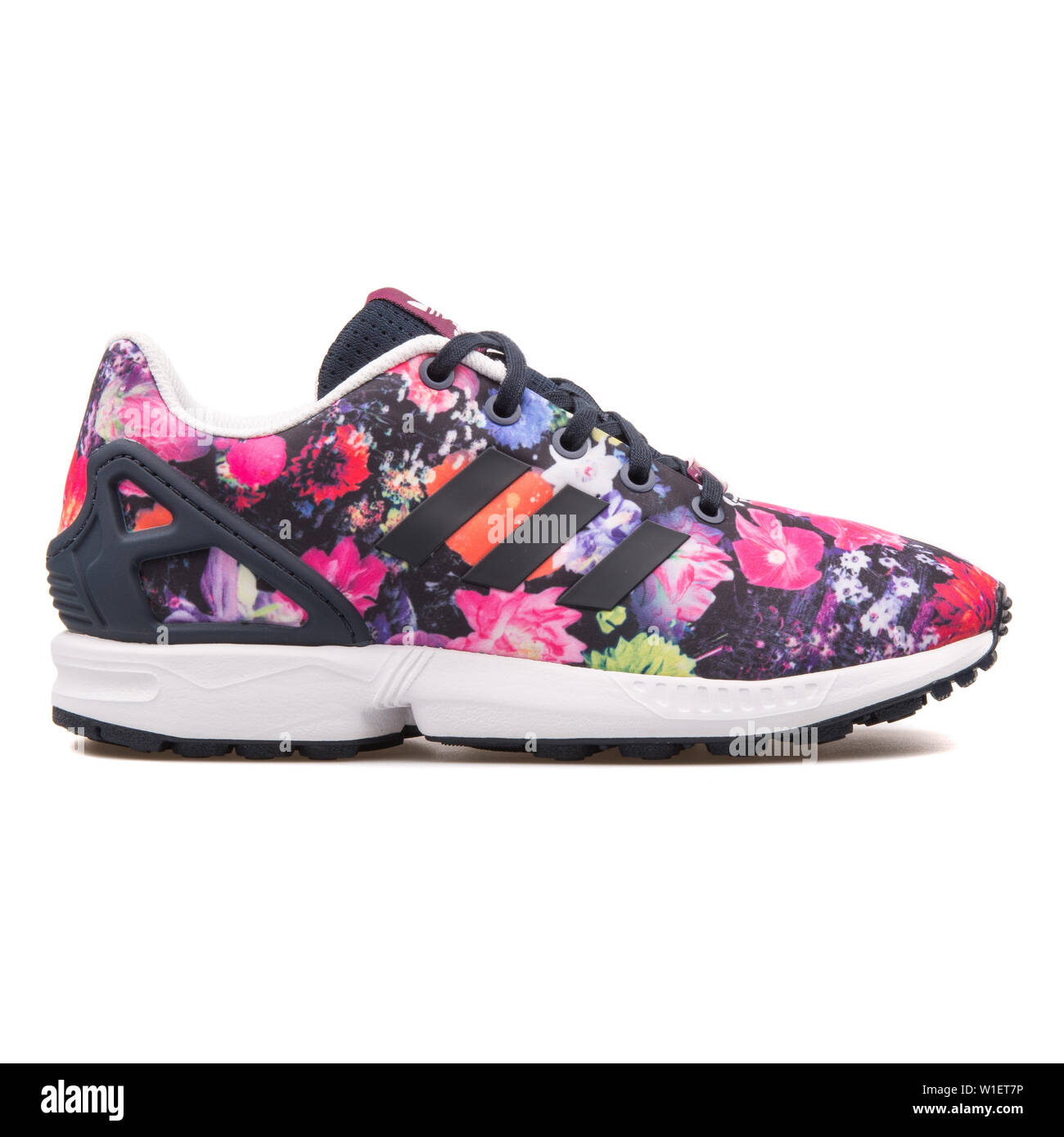 VIENNA, AUSTRIA - AUGUST 10, 2017: Adidas ZX Flux black and multi color  floral print sneaker on white background Stock Photo - Alamy