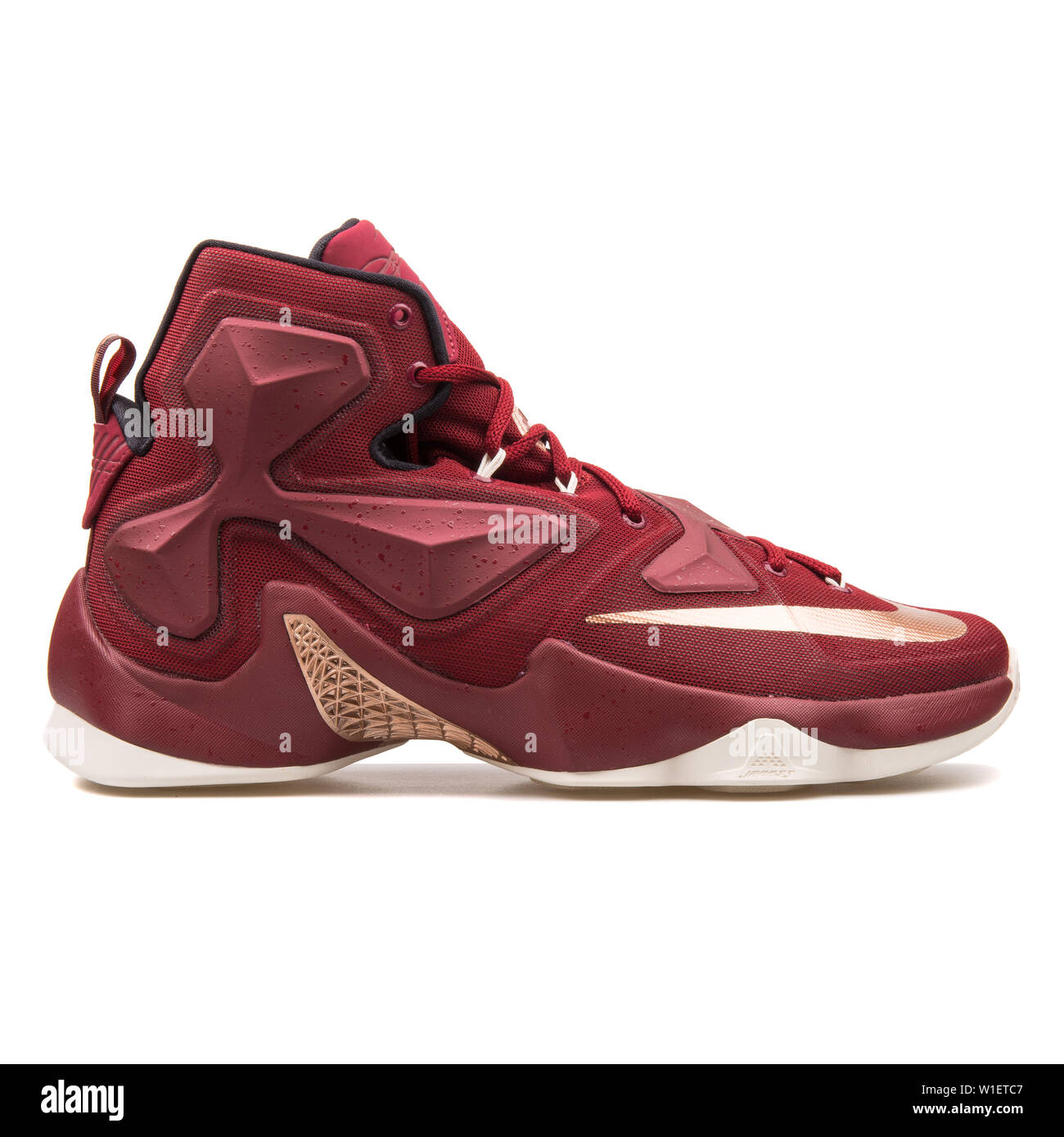 VIENNA, AUSTRIA - AUGUST 10, 2017: Nike Lebron XIII team red and bronze  sneaker on white background Stock Photo - Alamy