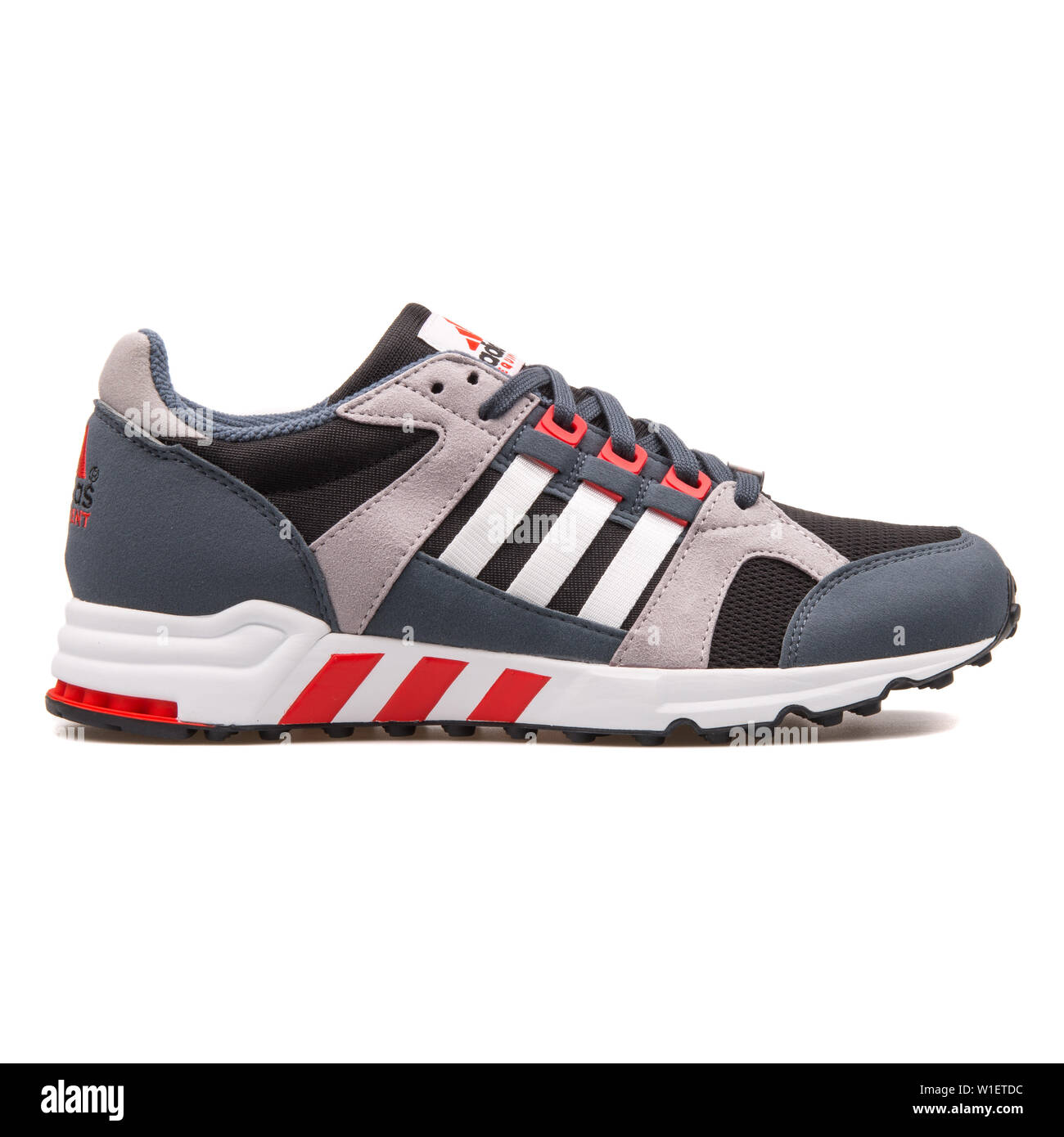 VIENNA, AUSTRIA - AUGUST 10, 2017: Adidas Equipment Running Cushion black,  blue, grey and red sneaker on white background Stock Photo - Alamy
