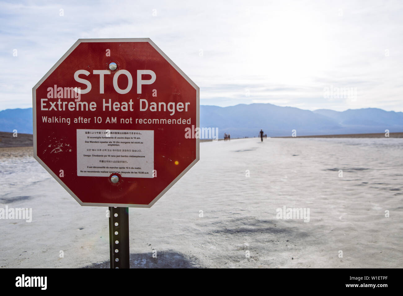 Stop Extreme Heat Danger sign in Badwater basin, endorheic basin, Death Valley National Park, Inyo, California, USA Stock Photo