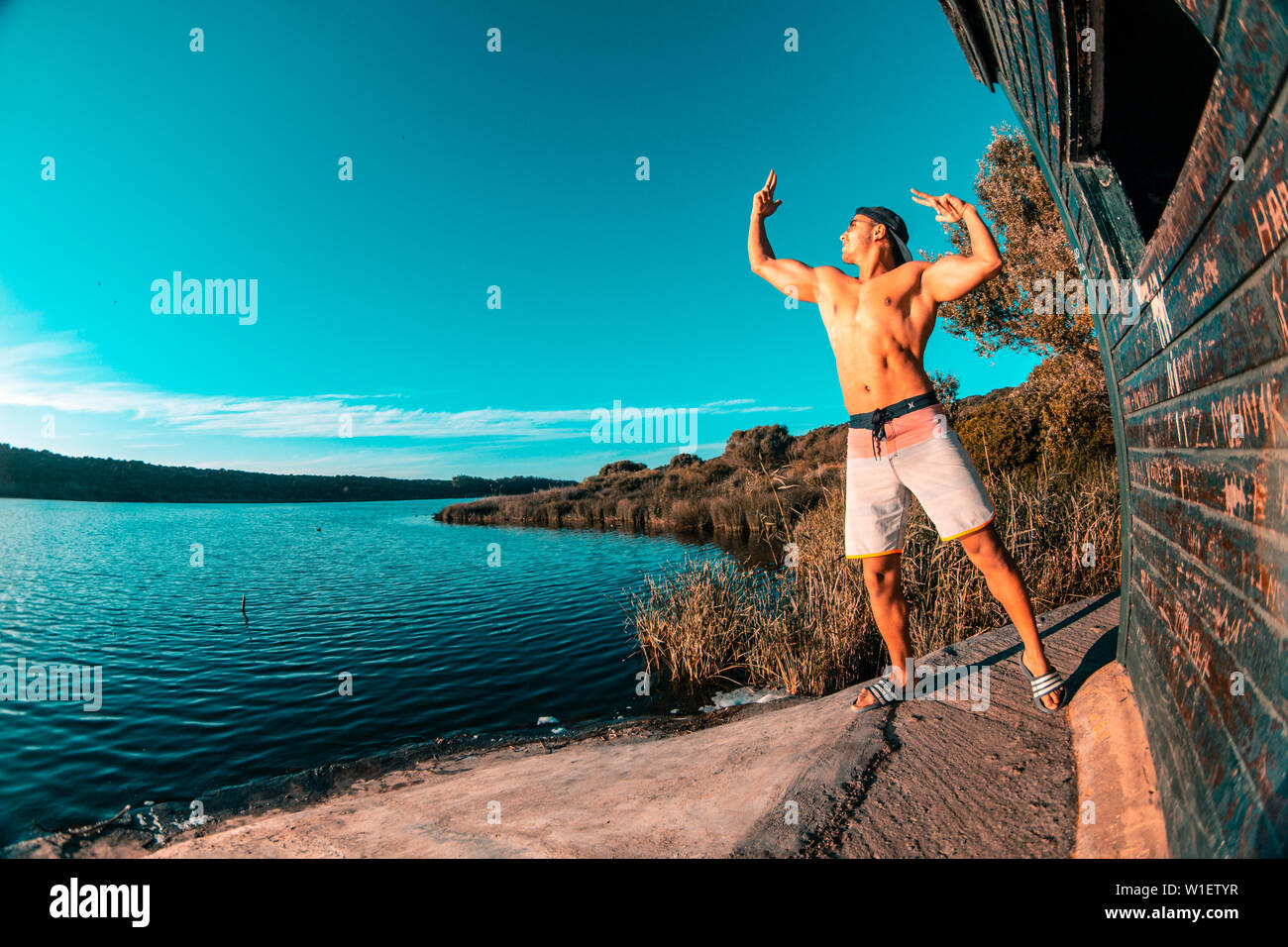 male model posing in nature , fit and bodybuilding model . crossfit outside  gym Stock Photo - Alamy